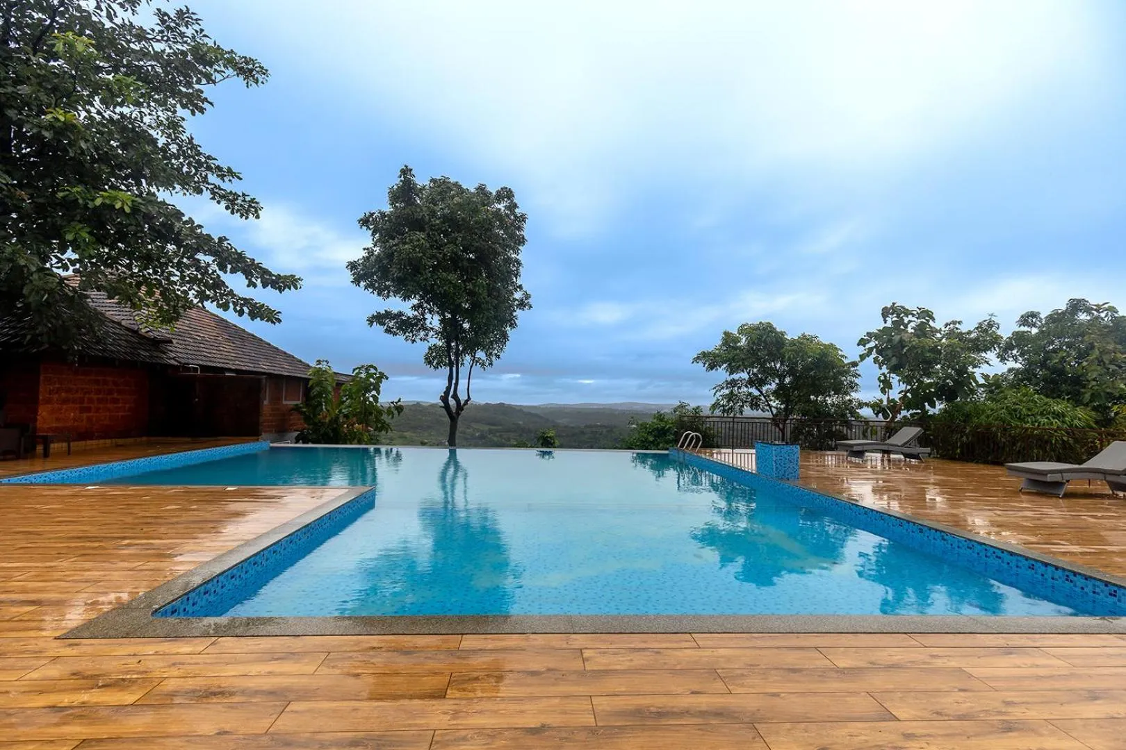 Swimming pool in SandalMist Resort and Spa