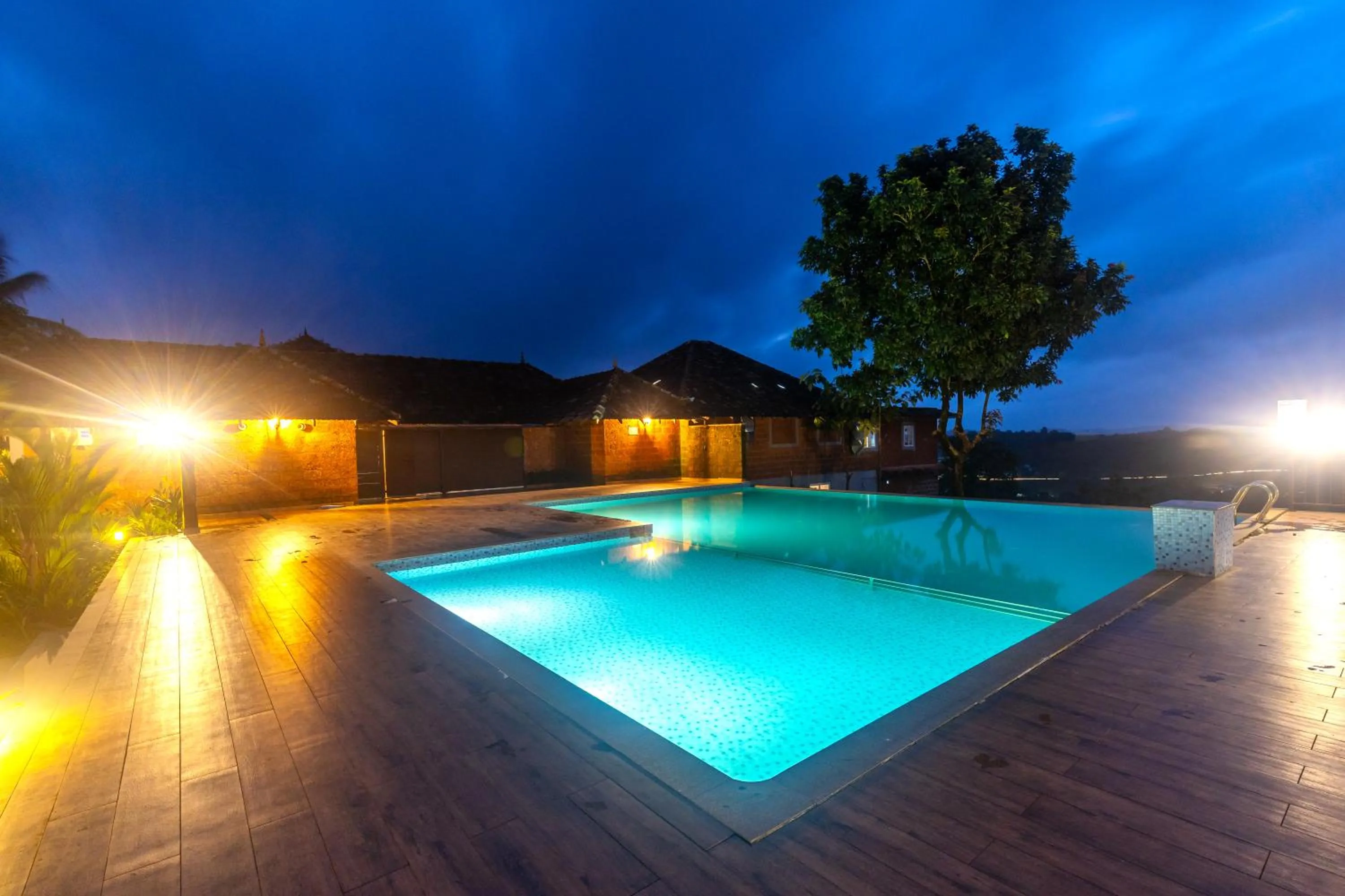 Swimming pool in SandalMist Resort and Spa