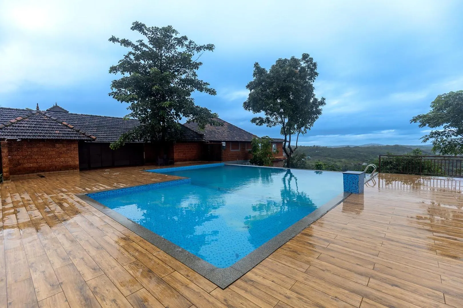 Swimming pool in SandalMist Resort and Spa