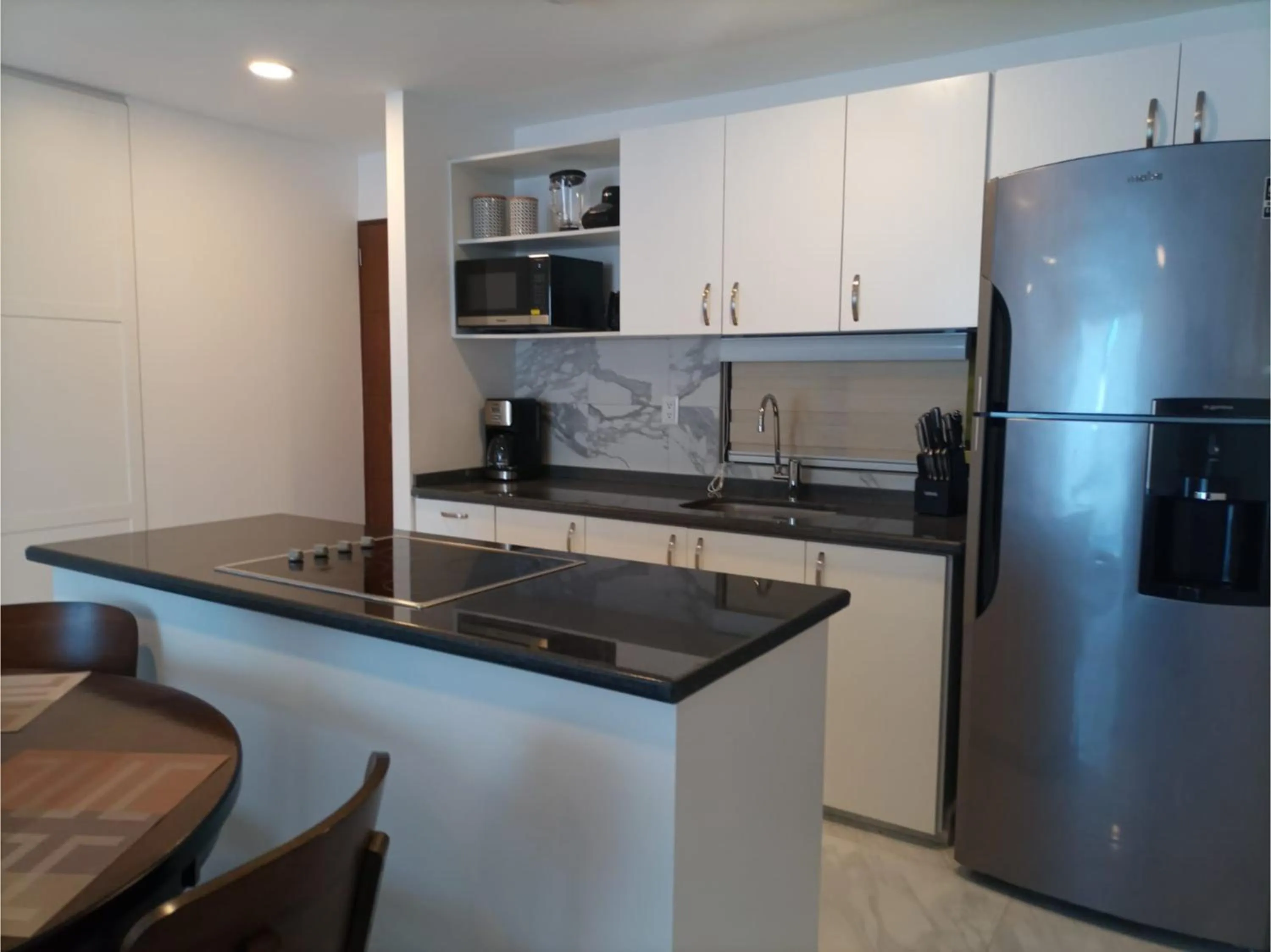 Kitchen or kitchenette in Collection O Morgan City Center, Los Cabos