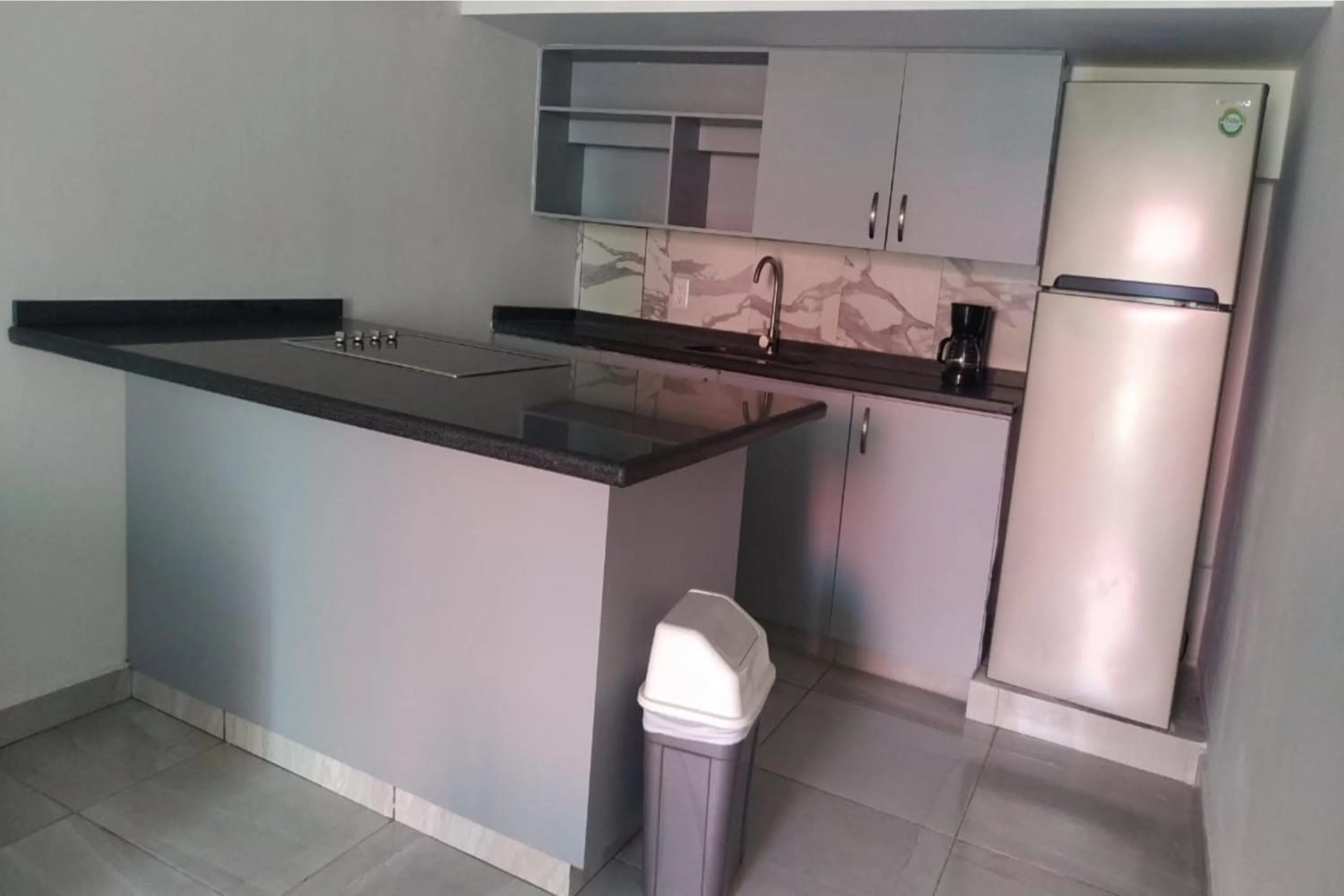 Kitchen or kitchenette in Collection O Morgan City Center, Los Cabos