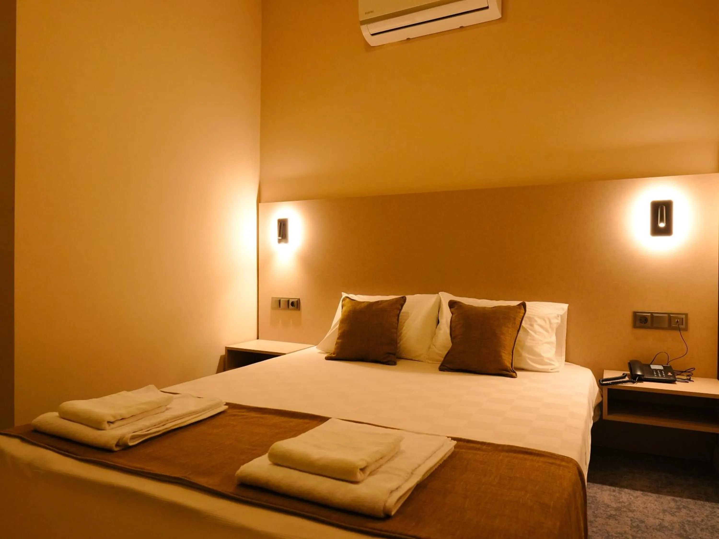 Bed in Bonnie City Hotel