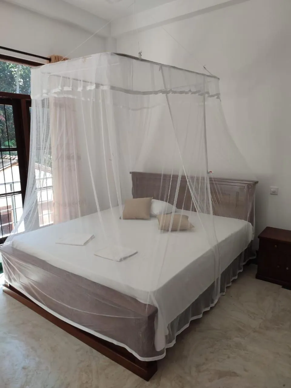 Bed in Hiru Resort Inn