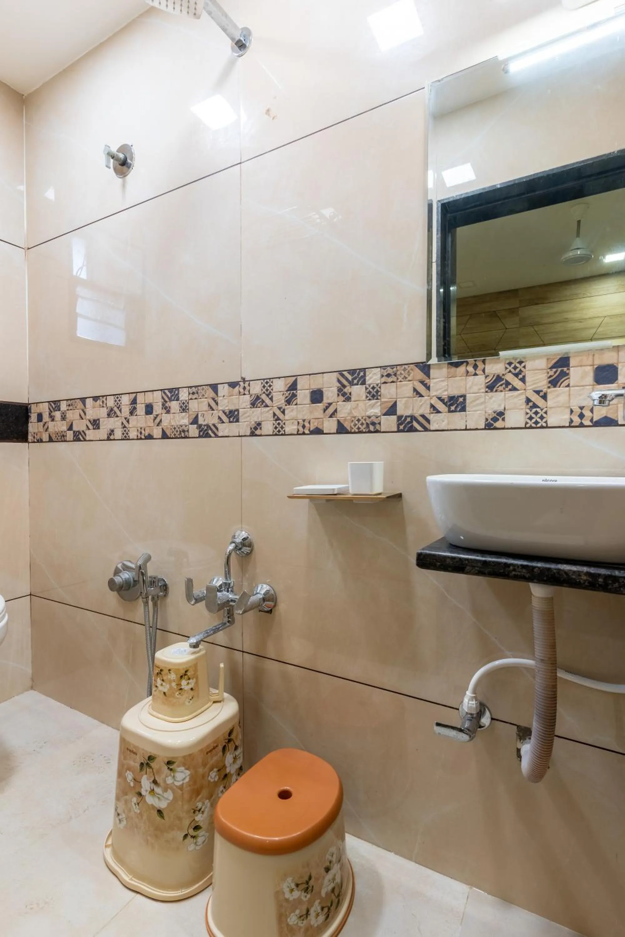 Shower in Hotel Noble Inn, Ahmedabad