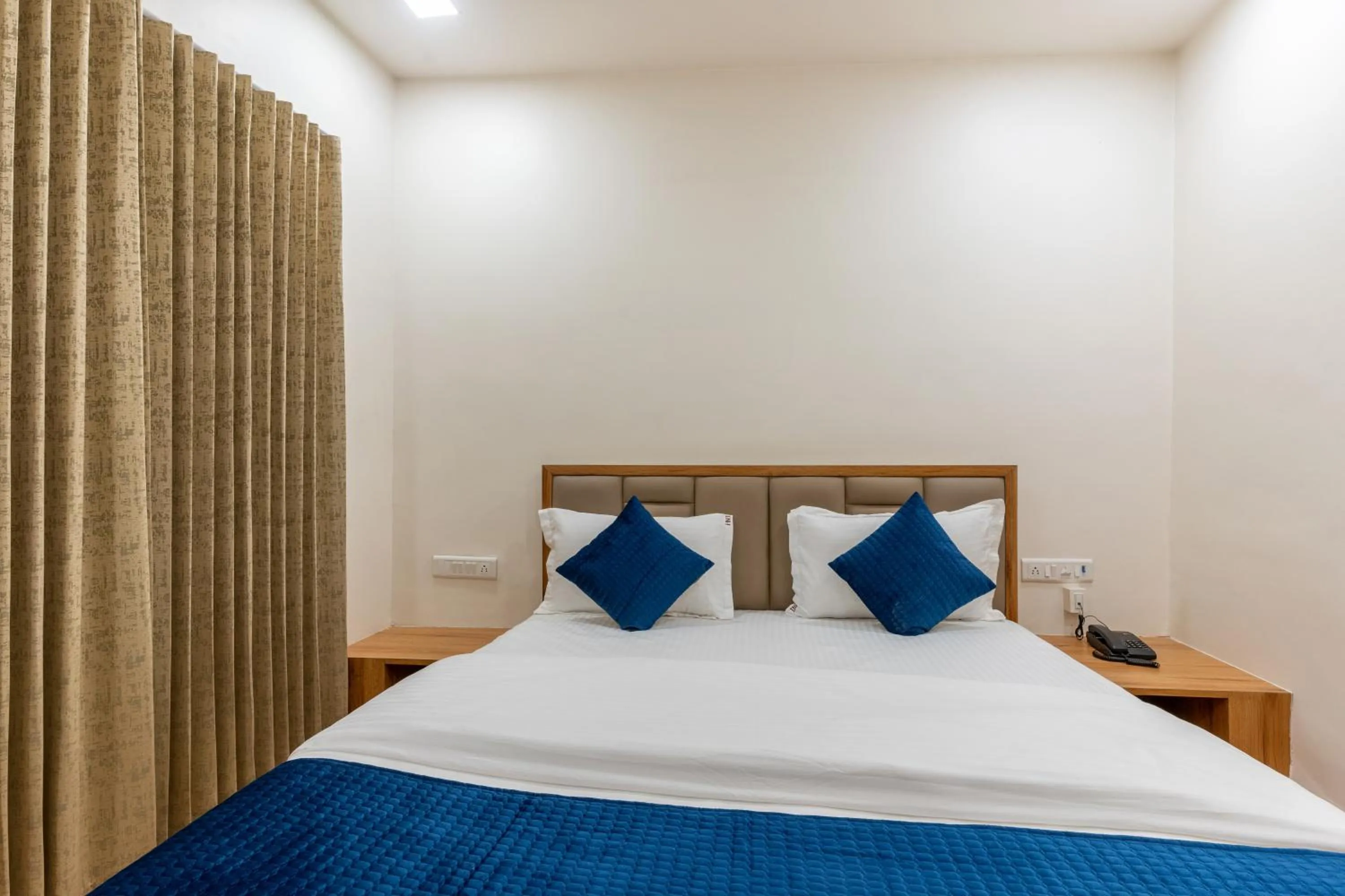 Photo of the whole room, Bed in Hotel Noble Inn, Ahmedabad