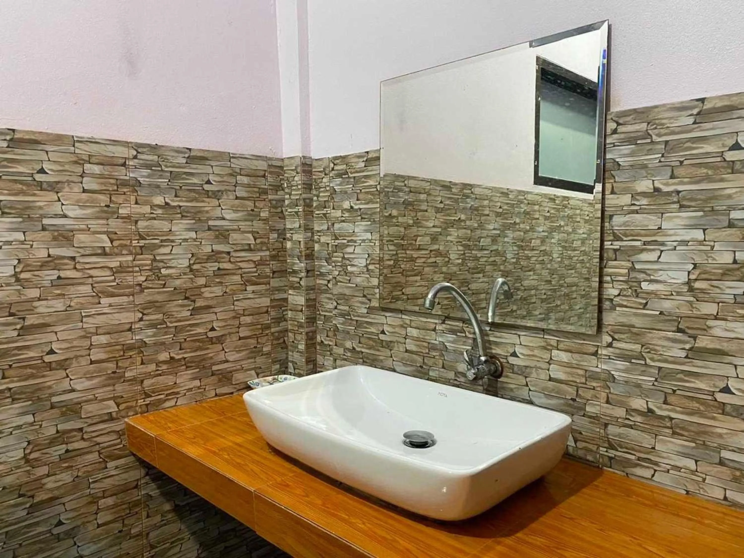 Bathroom in OYO 75524 SK Resort