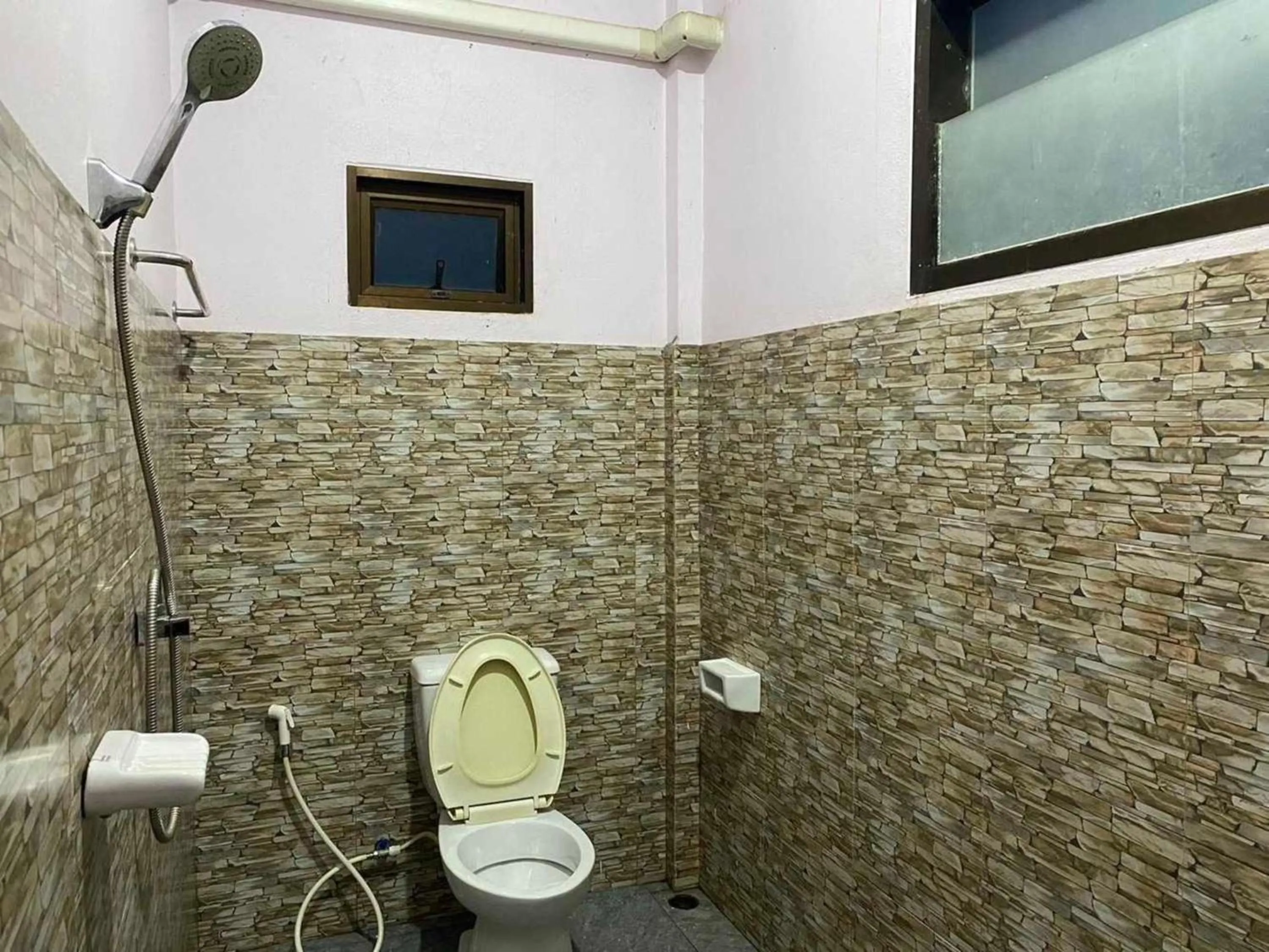 Bathroom in OYO 75524 SK Resort