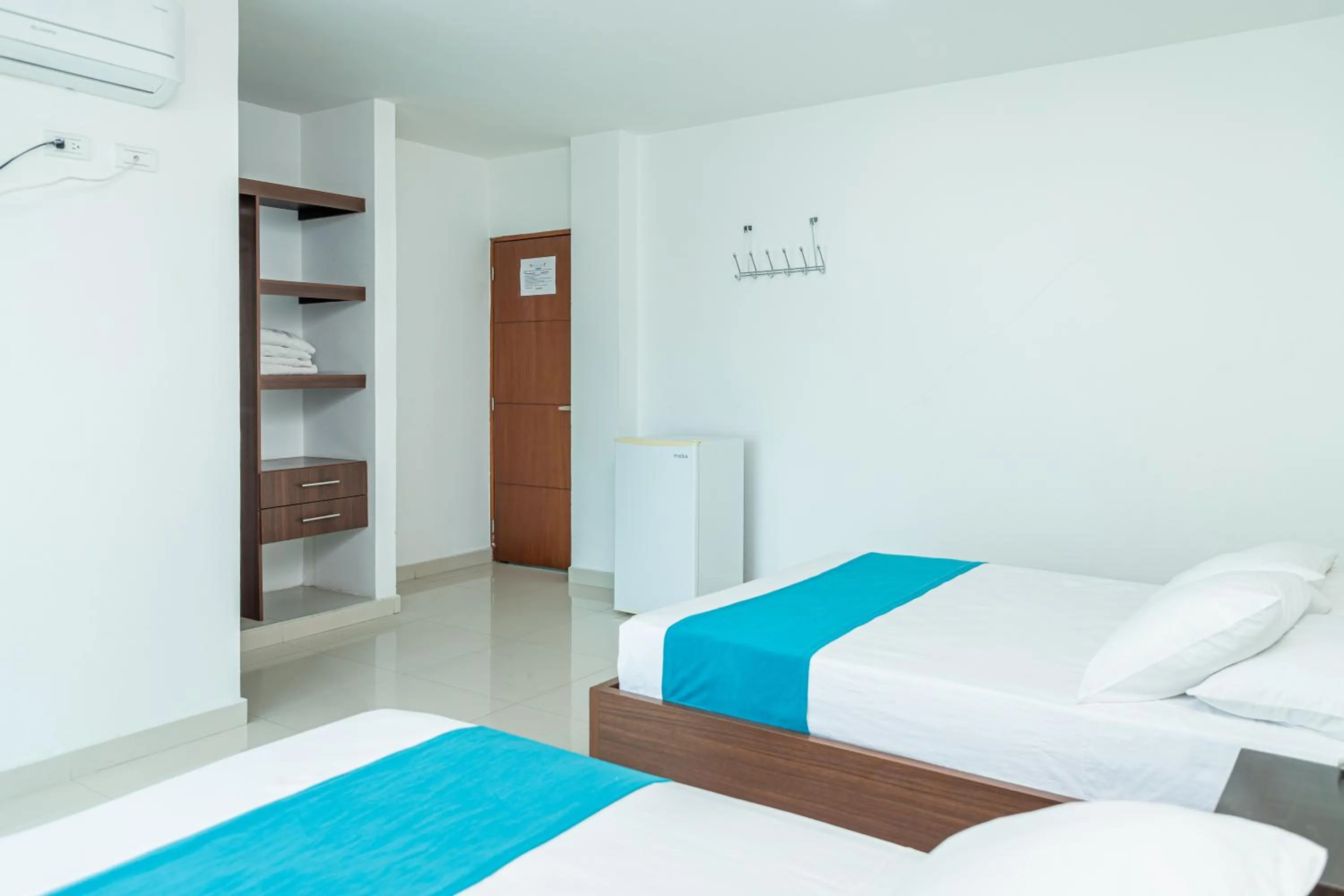 View (from property/room), Bed in Hotel Aguamarina