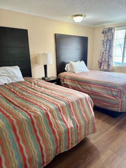 Bed in Gratiot View Motel