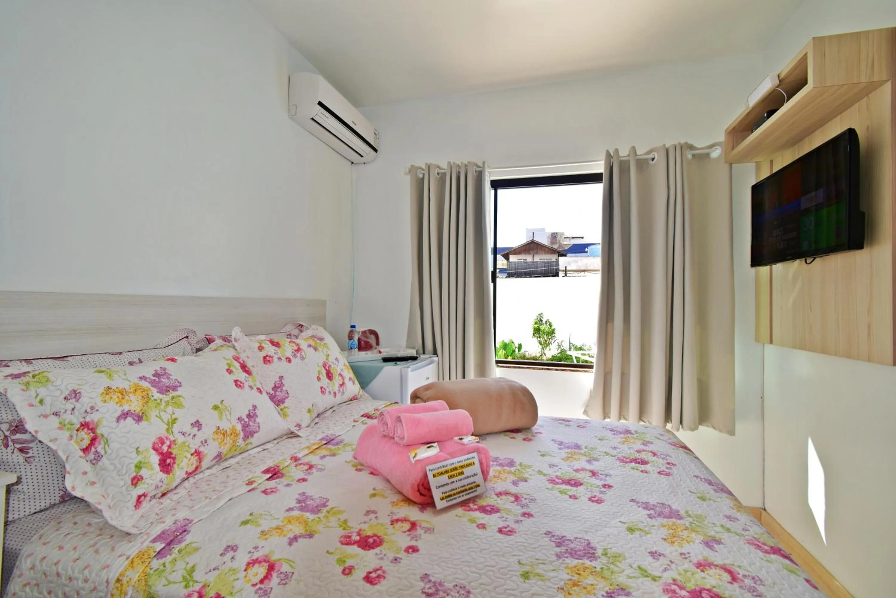 Bed in Pousada Enseada dos Golfinhos