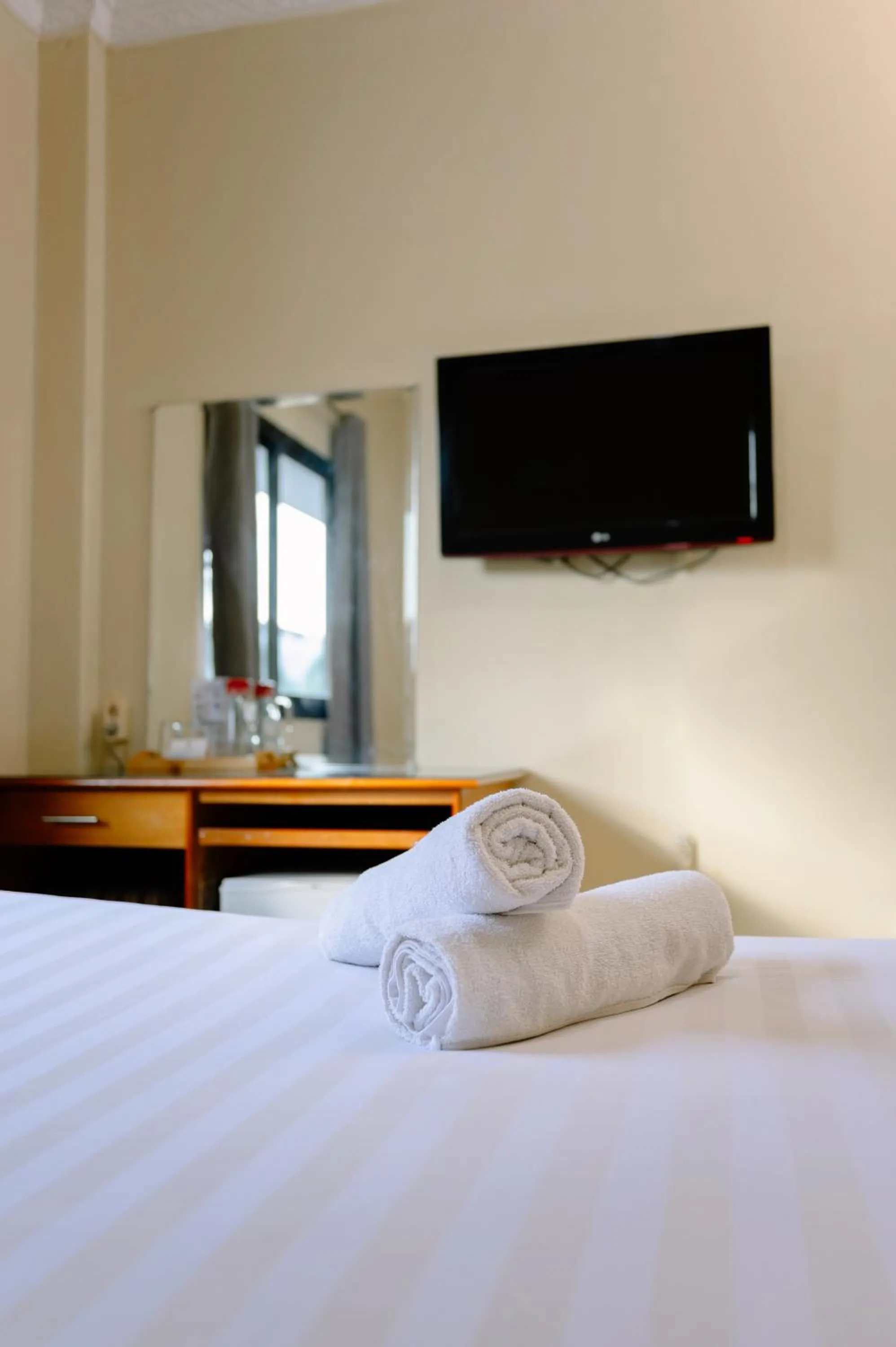 Bed in Kartika Sriwijaya Hotel