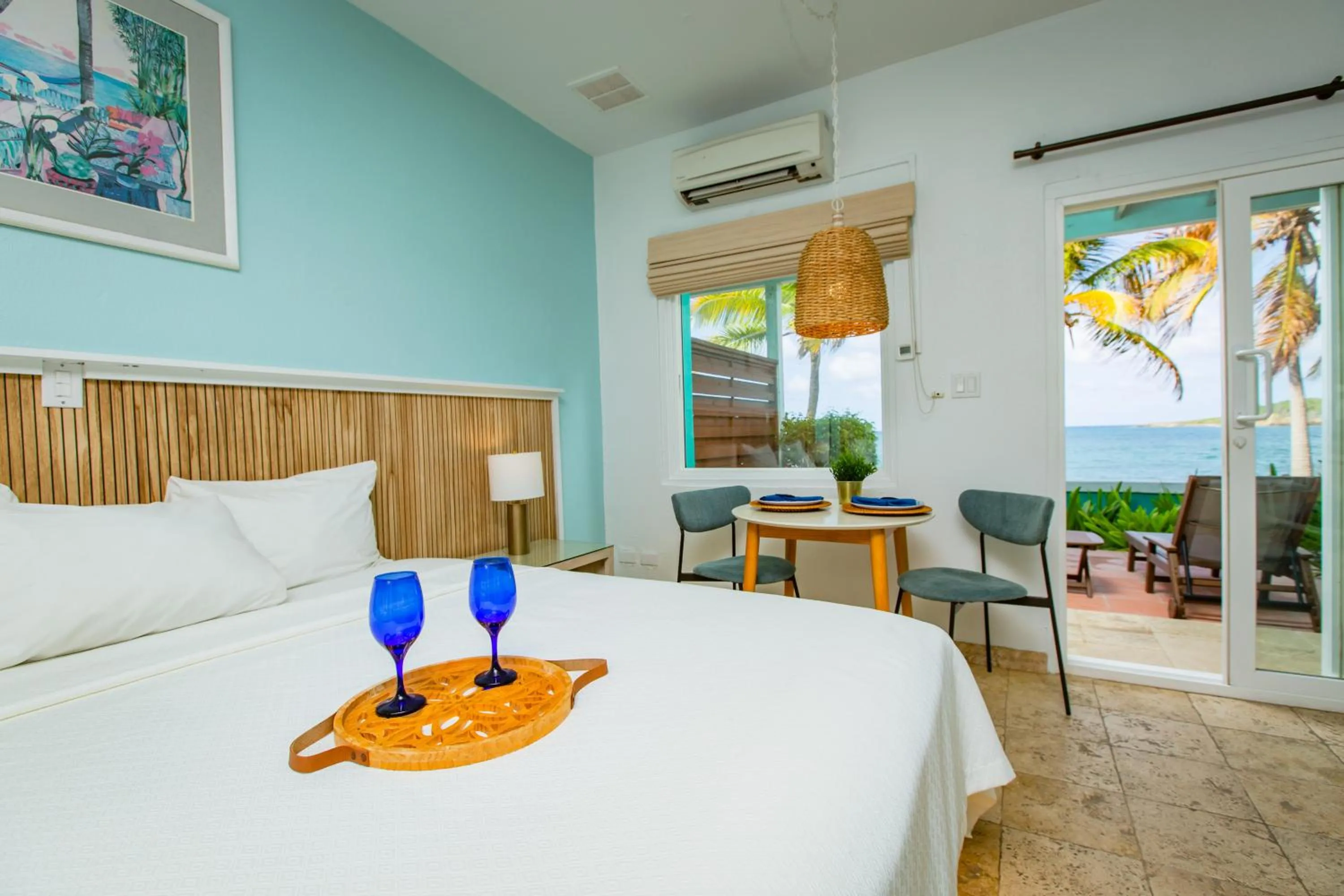 Seating area, Bed in Tamarind Reef Resort Spa & Marina