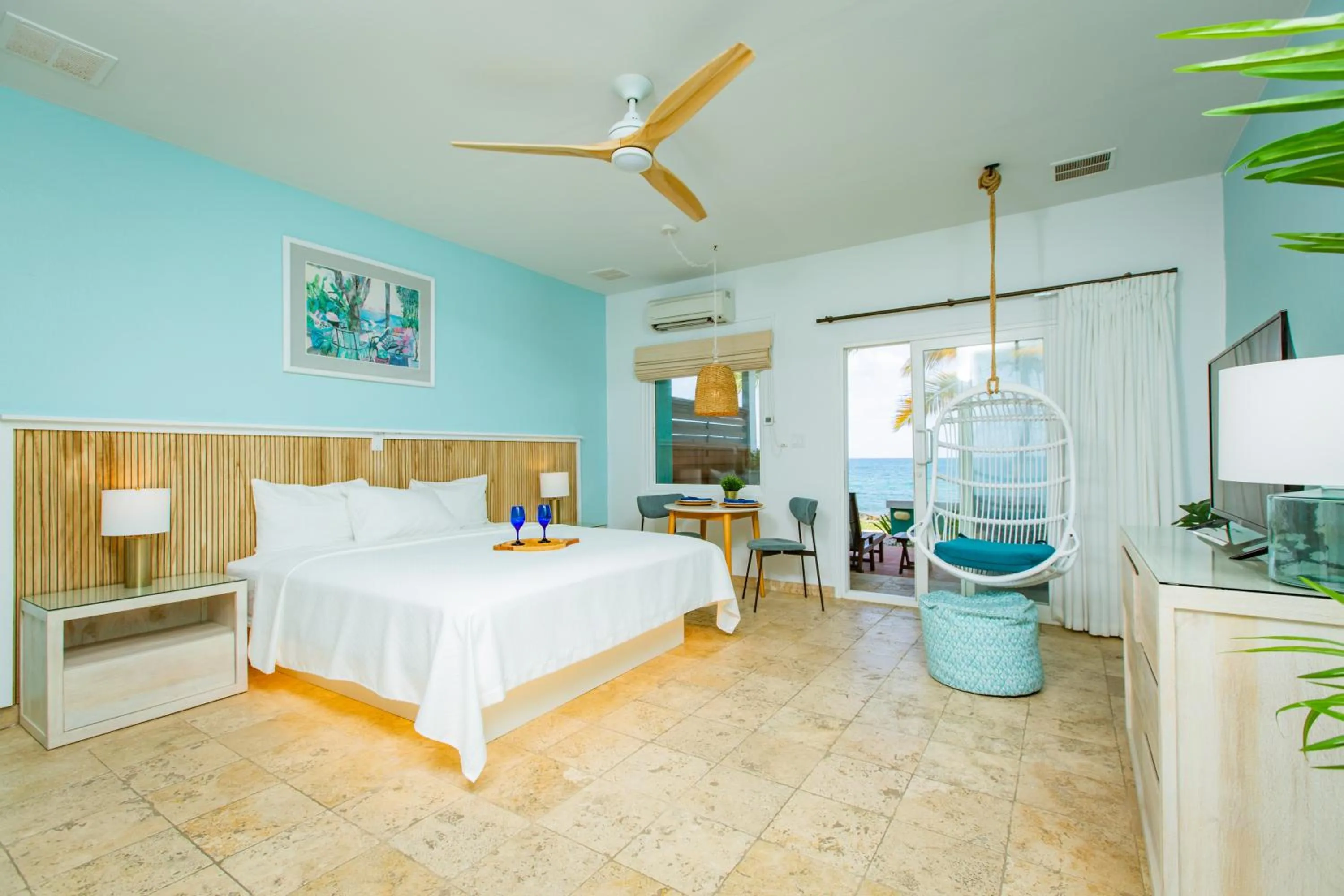 Bed in Tamarind Reef Resort Spa & Marina