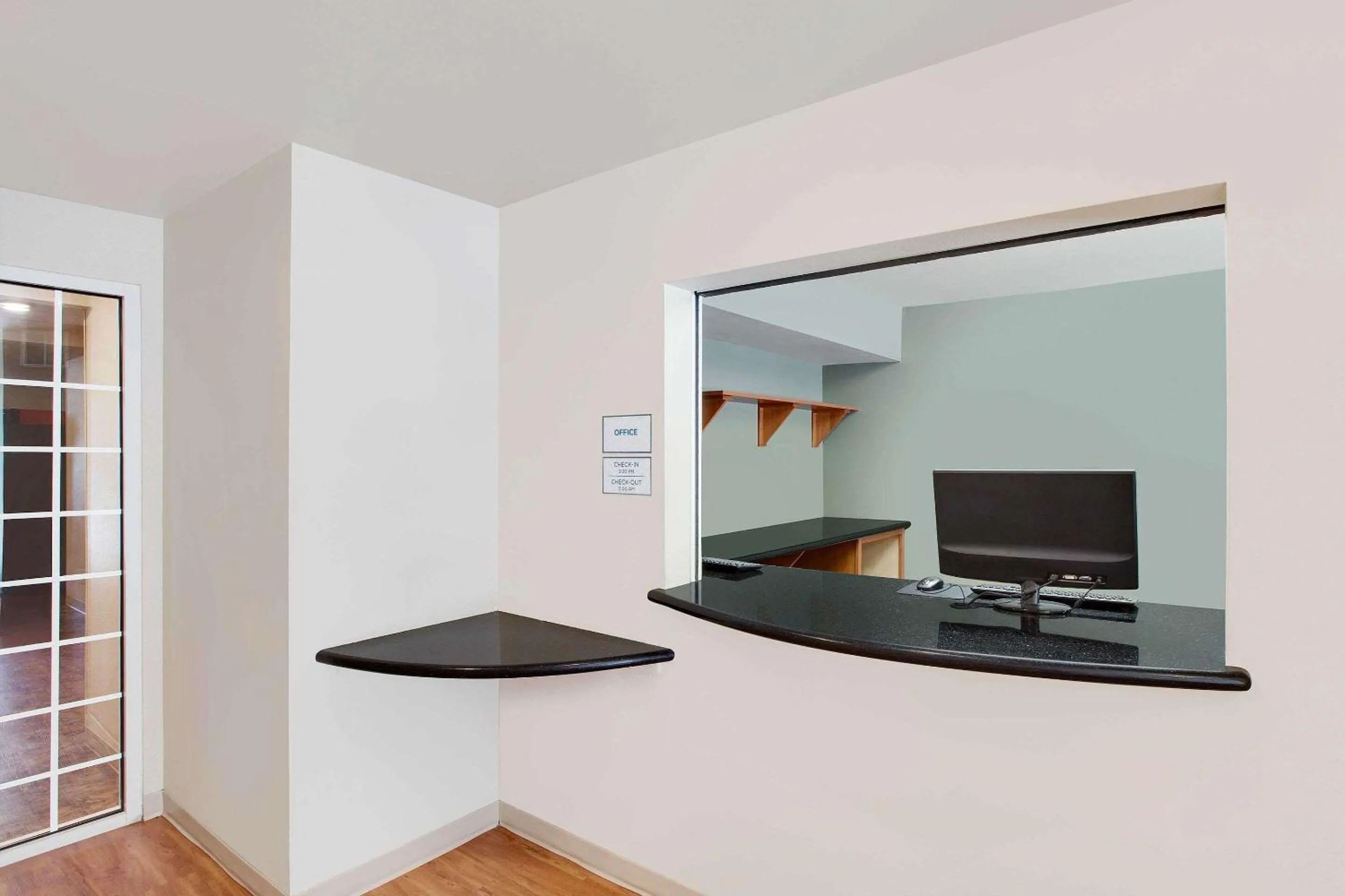 Lobby or reception in WoodSpring Suites Lake Charles