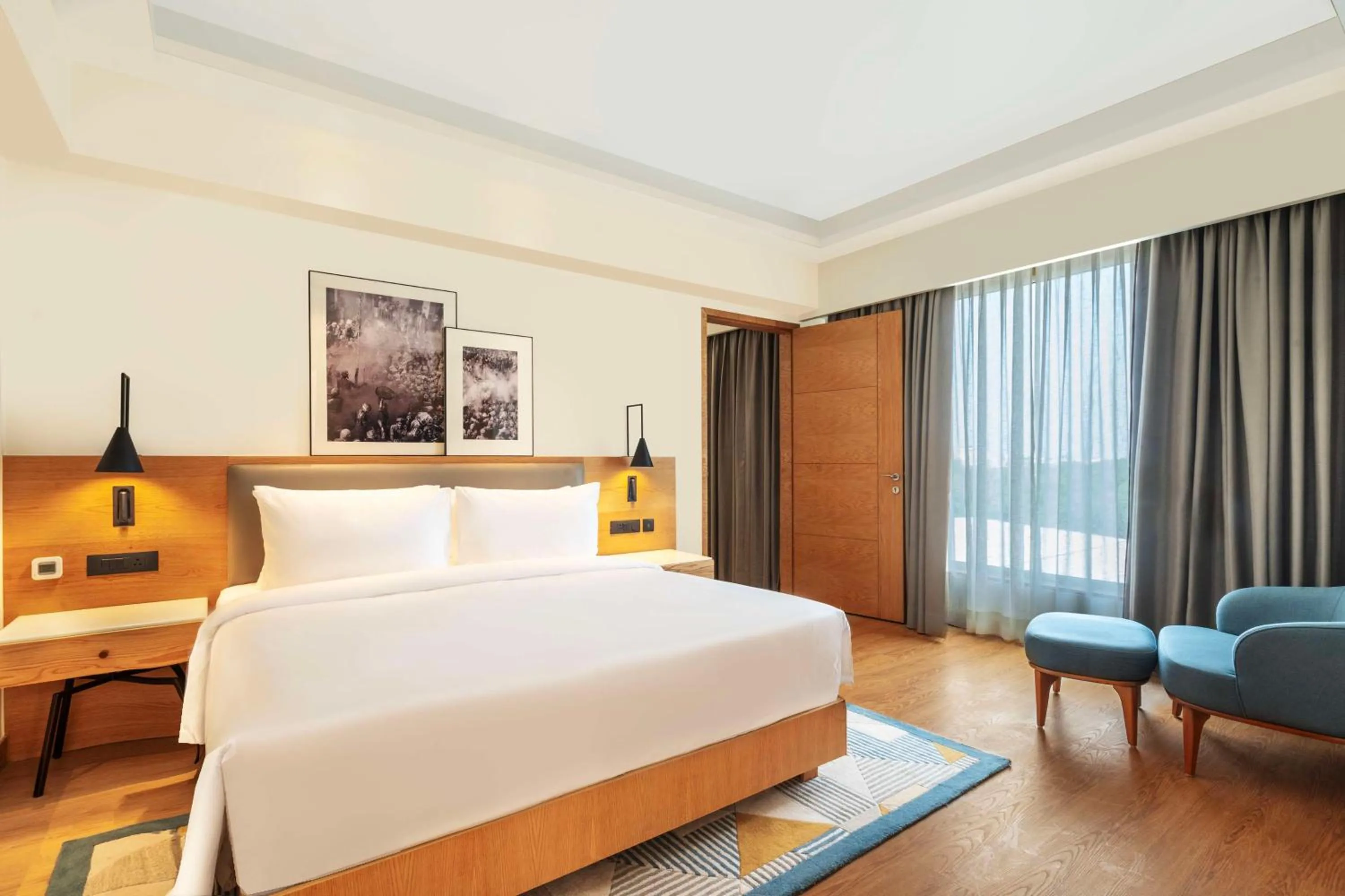 Photo of the whole room, Bed in Radisson Hotel Vrindavan