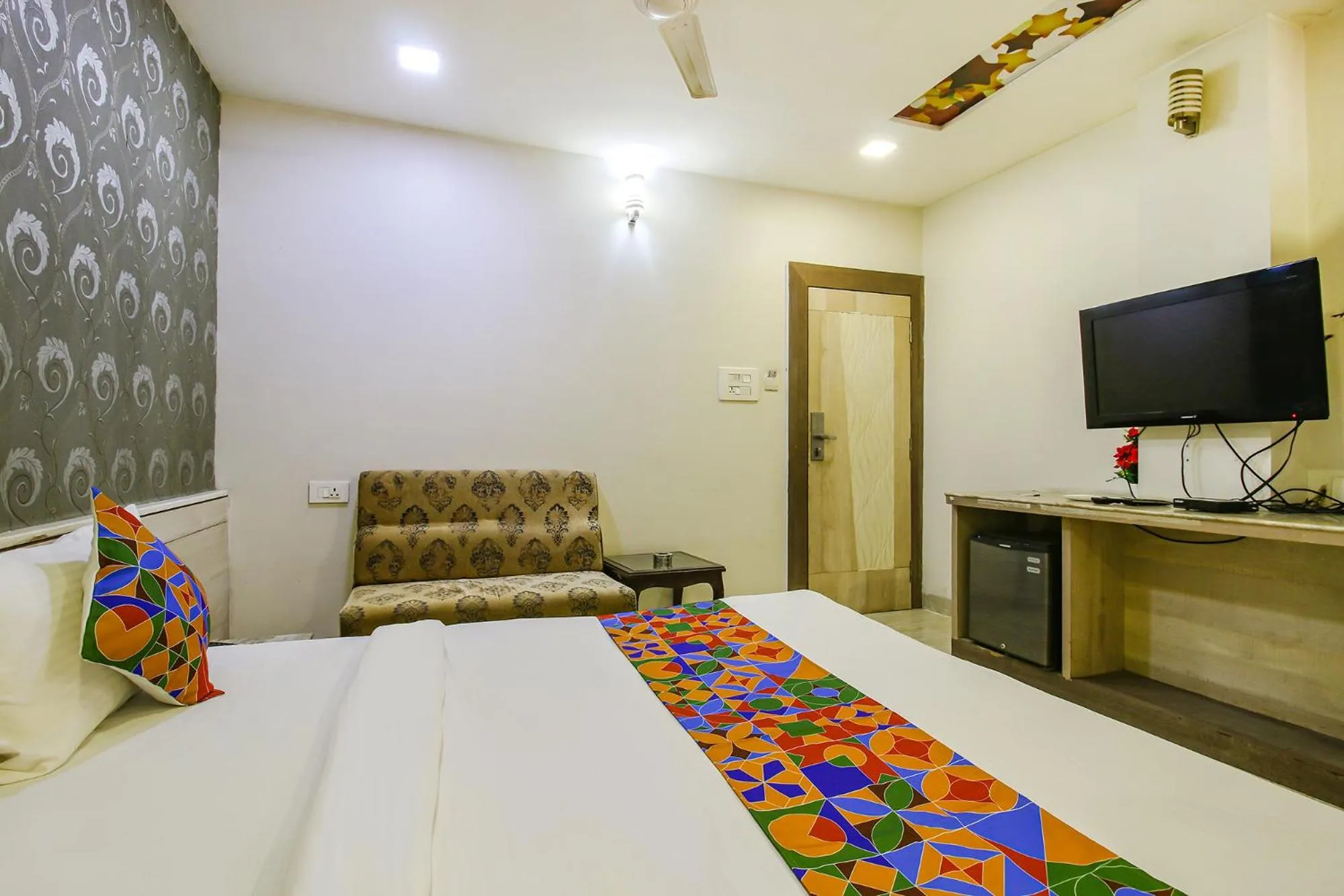 Bed in FabHotel Smriti Star