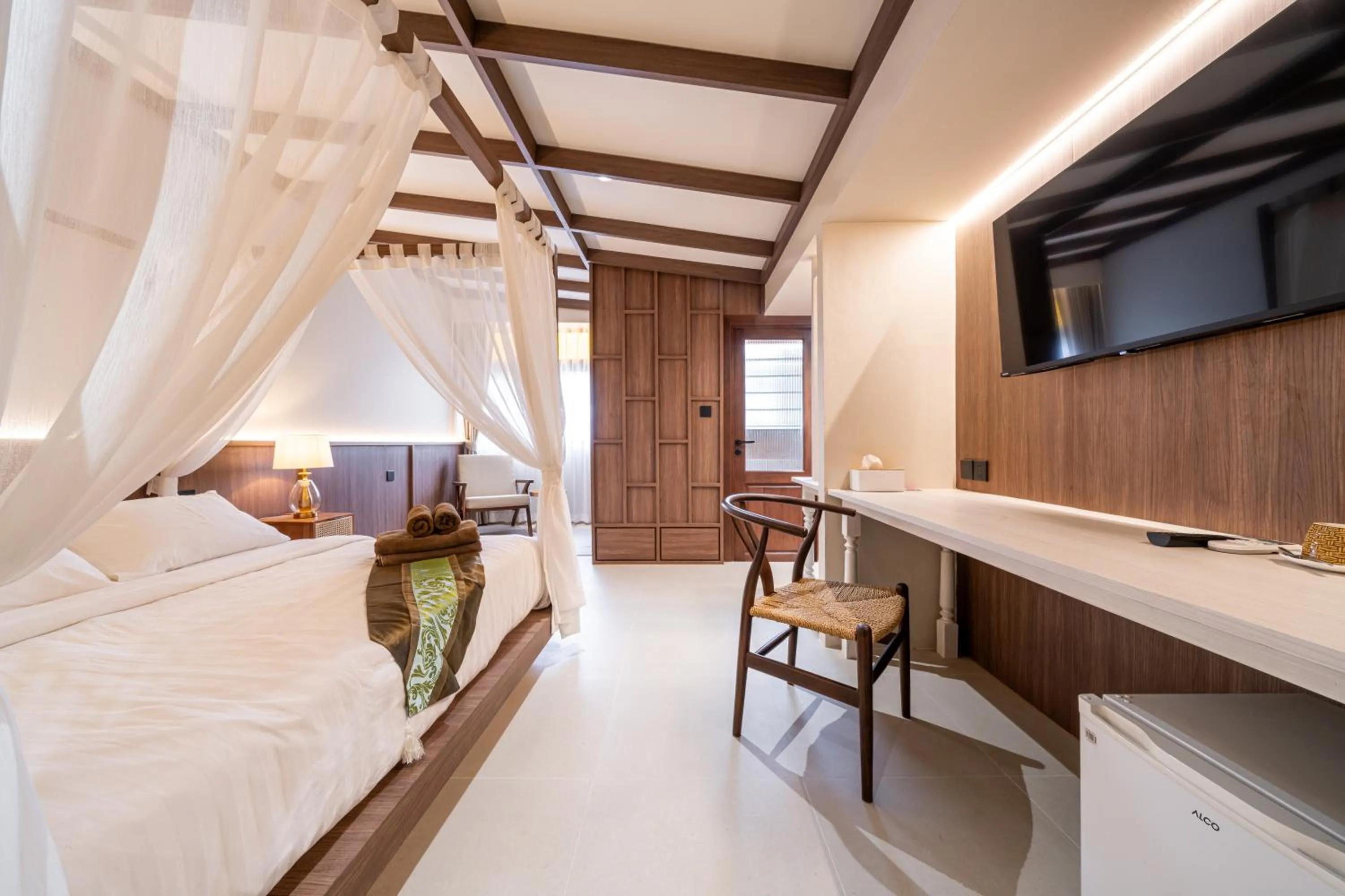 Bed in Athithara Homestay