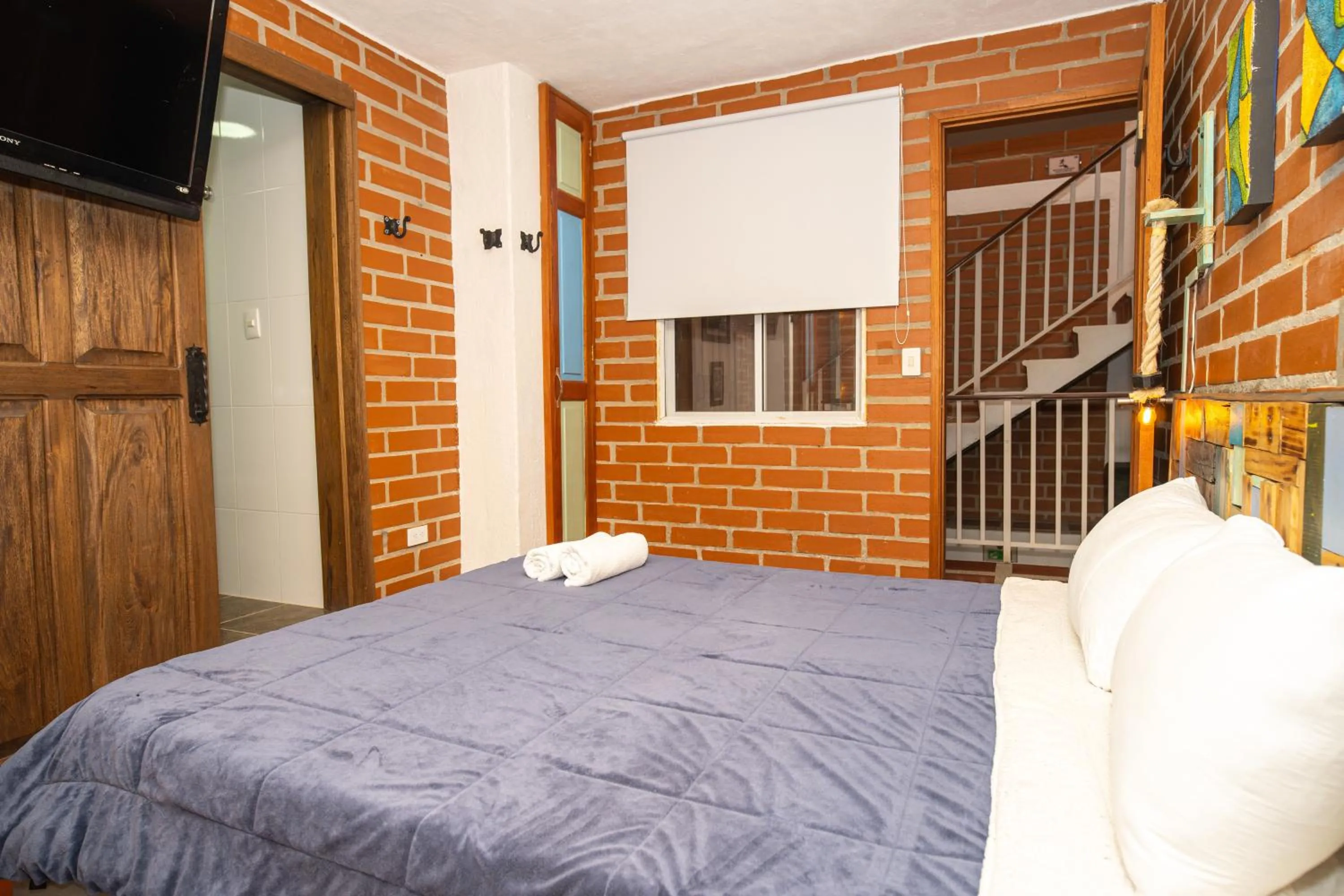 Bed in Hotel Spa Bliss Guatape