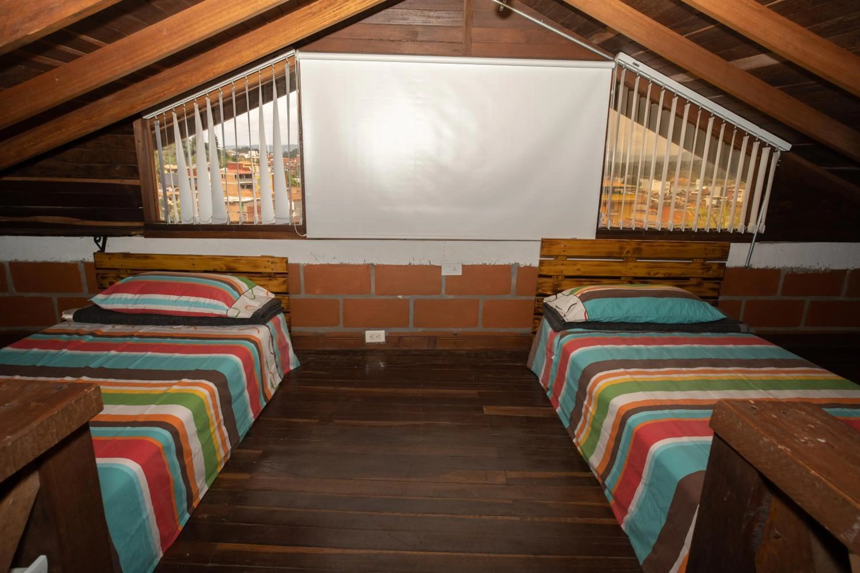 Bed in Hotel Spa Bliss Guatape