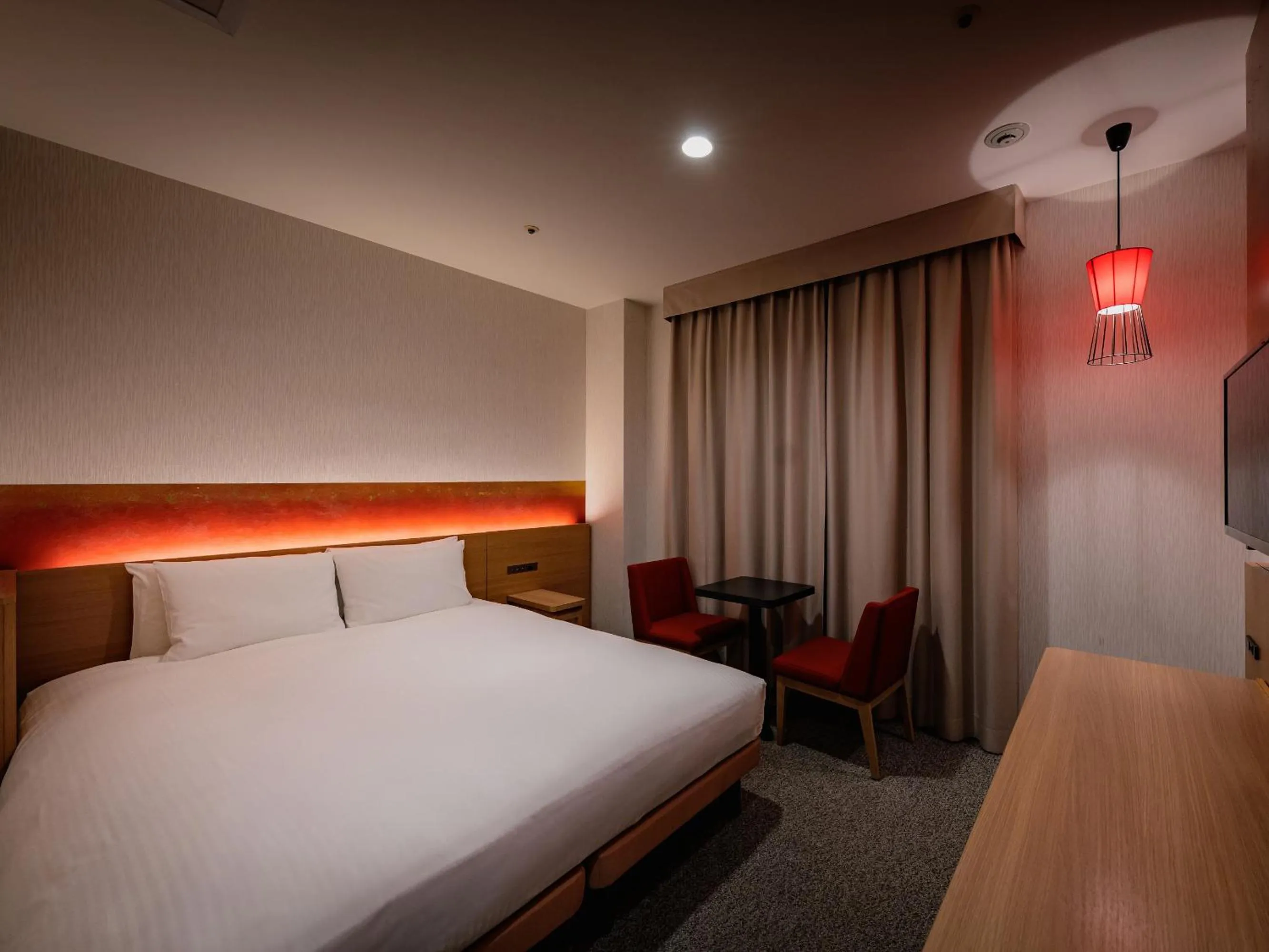 Bed in Loisir Hotel Classic Garden Kyoto Sanjo