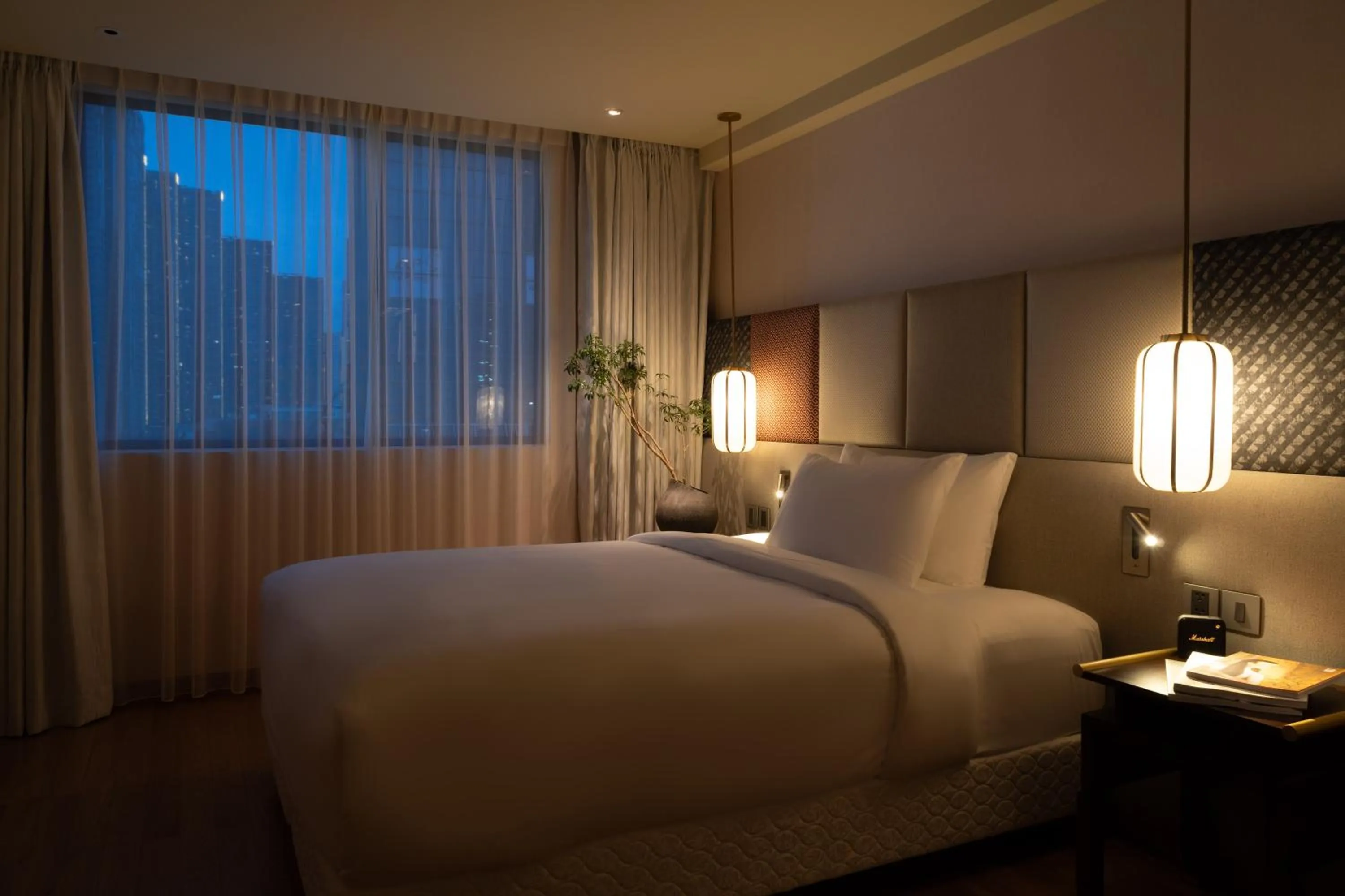 Bed in Suzu Saigon - A Boutique Hotel