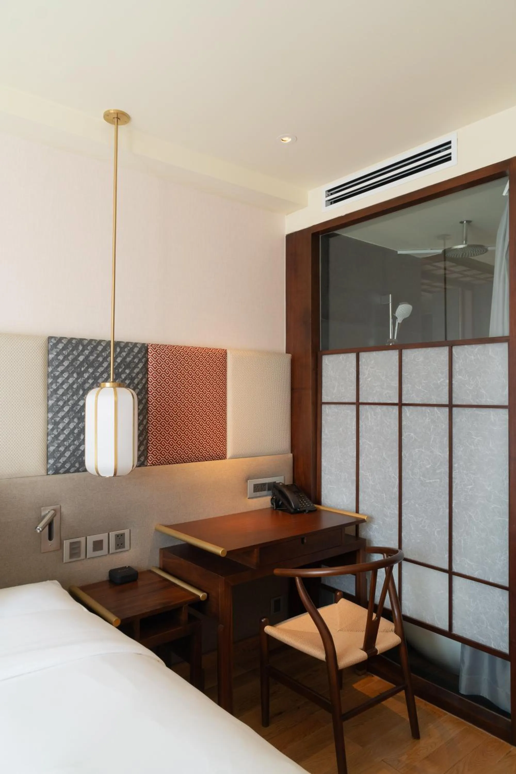 Bed in Suzu Saigon - A Boutique Hotel