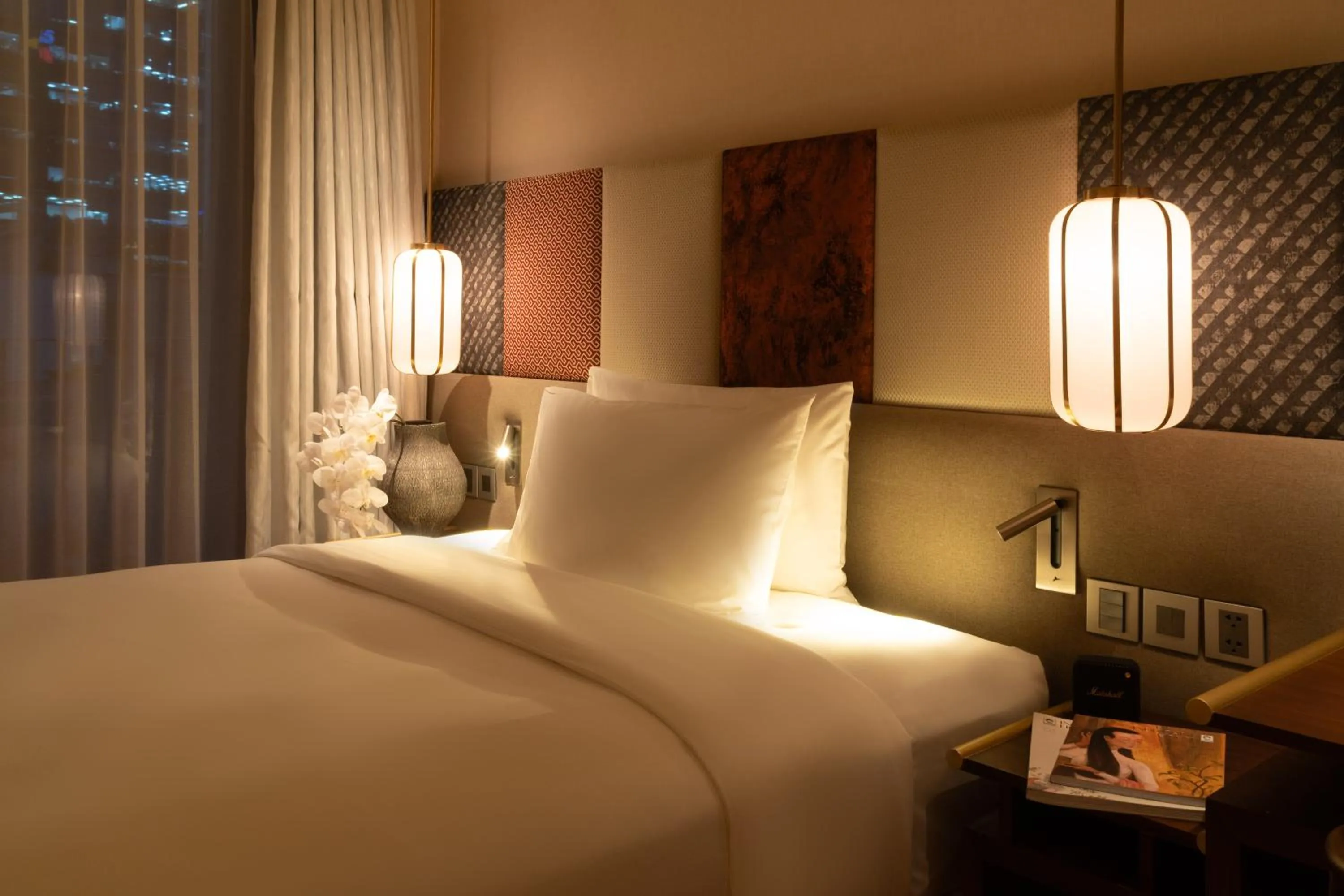 Bed in Suzu Saigon - A Boutique Hotel