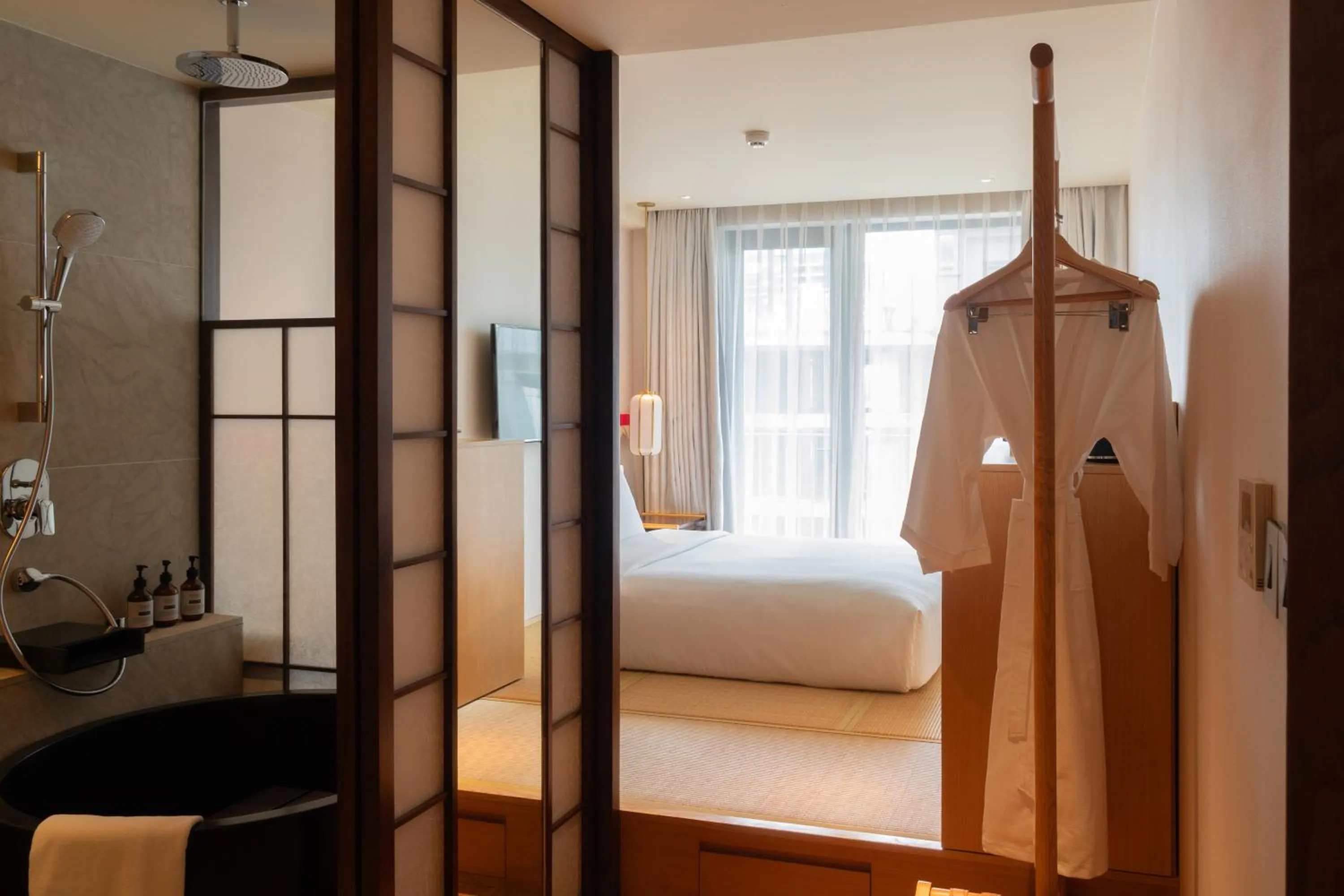 Bed in Suzu Saigon - A Boutique Hotel