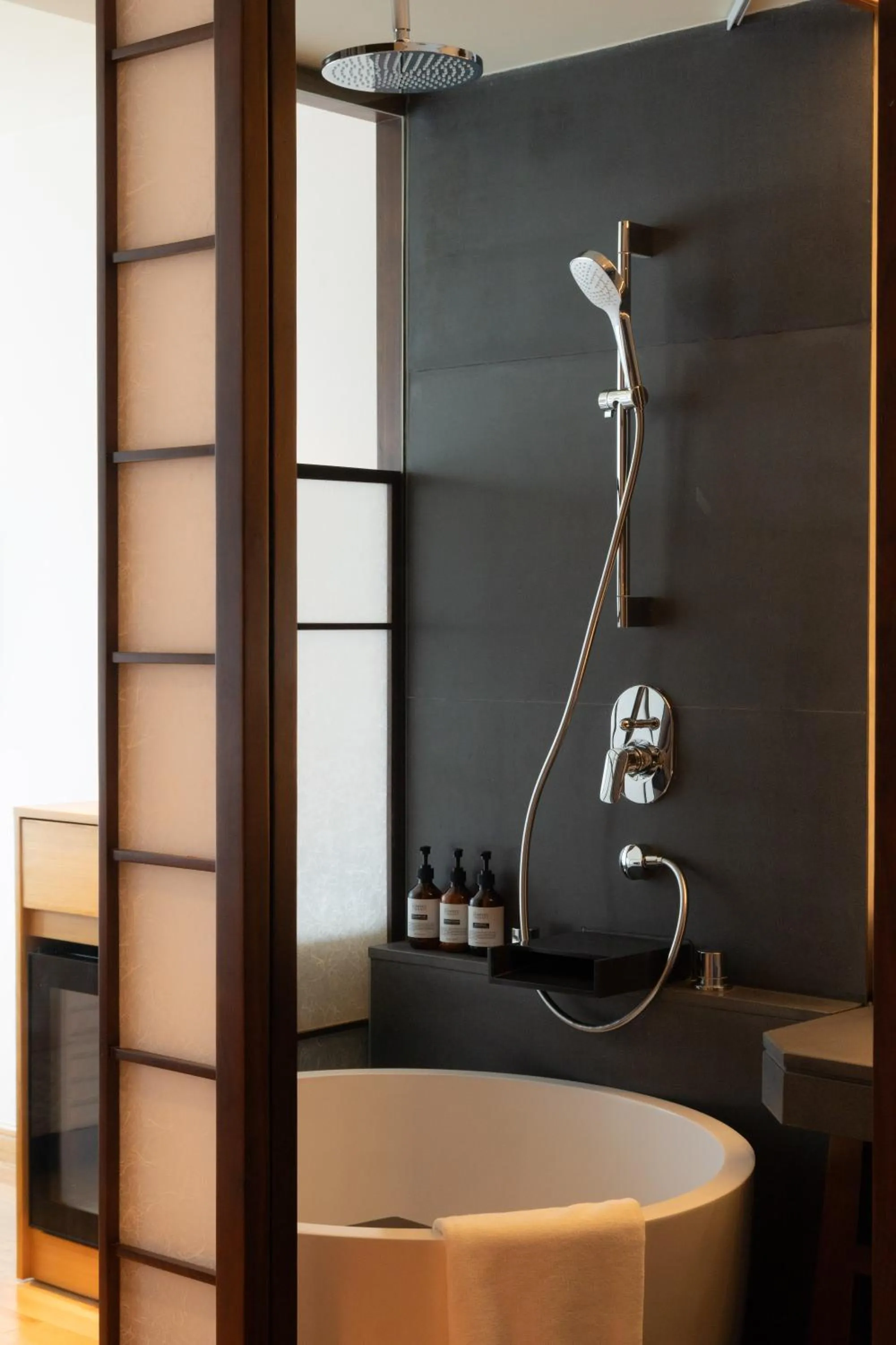 Shower in Suzu Saigon - A Boutique Hotel