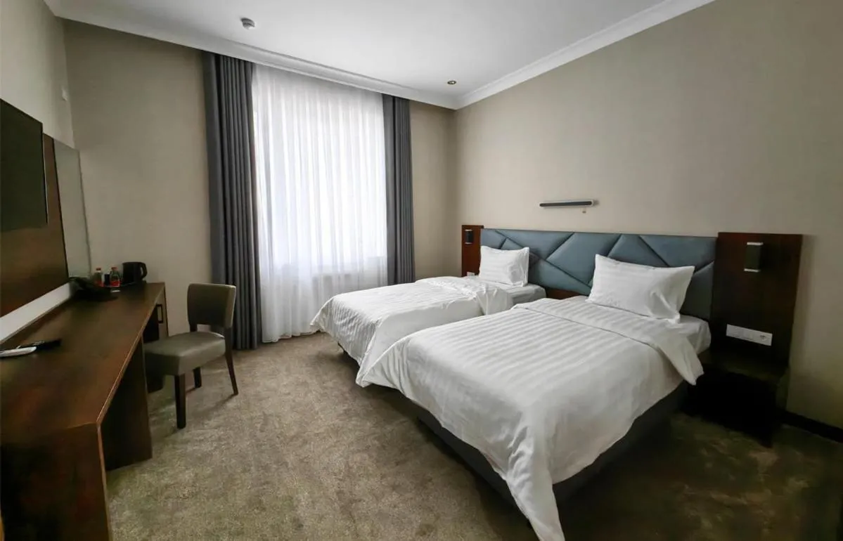 Bed in Reikartz Qarshi