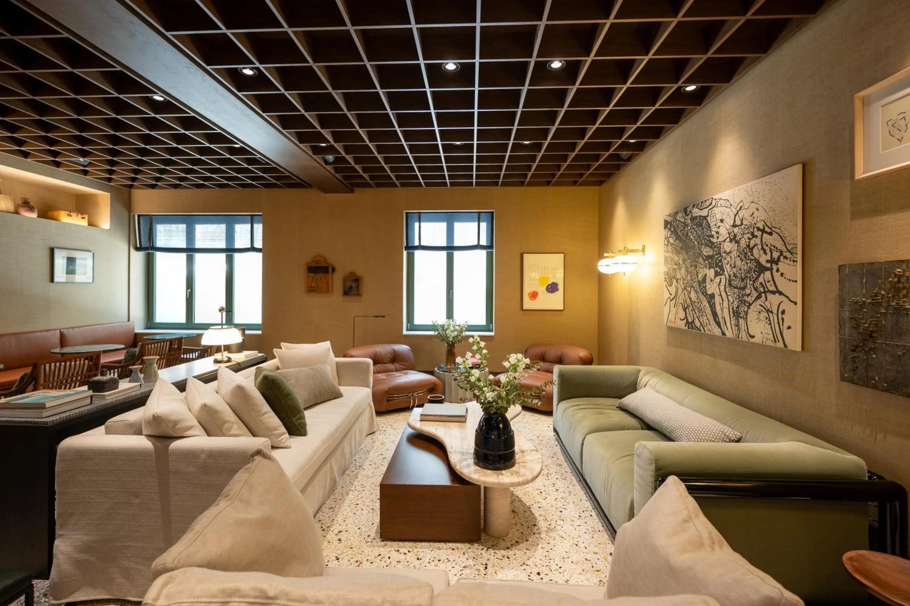Communal lounge/ TV room in Athens Capital Suites-MGallery Collection
