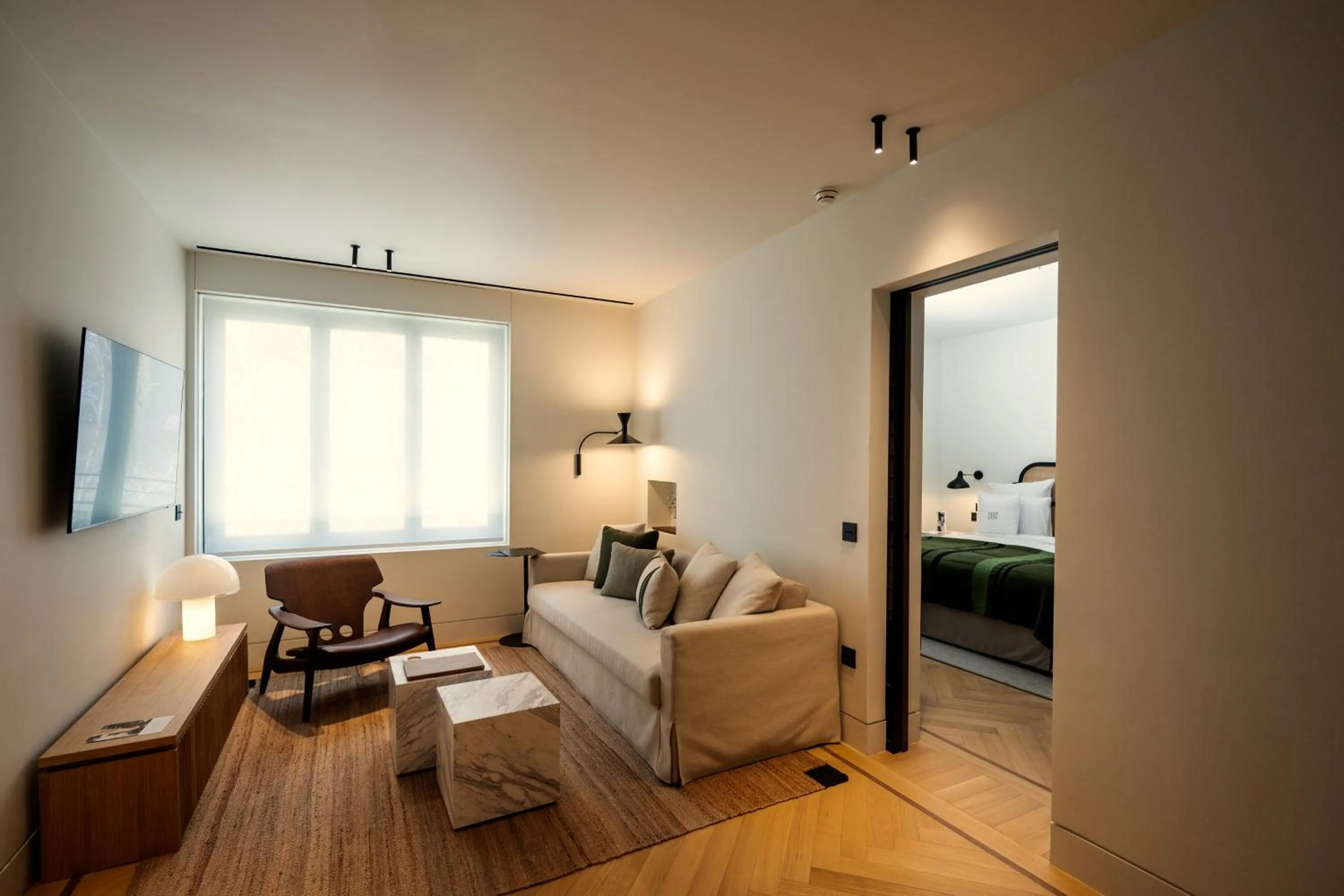 Living room, Bed in Athens Capital Suites-MGallery Collection