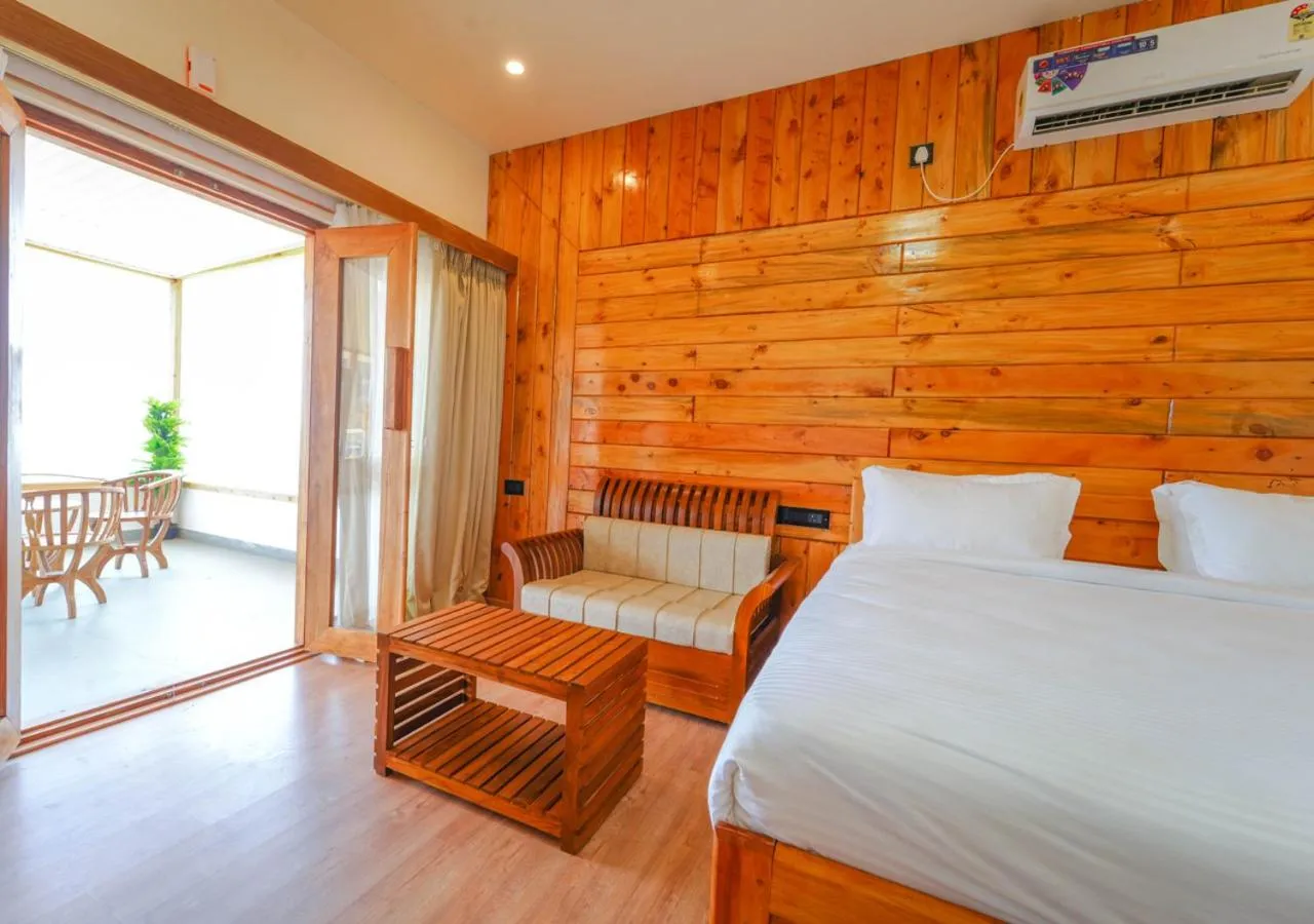 Bed in Silent Retreat Ooty Pool Resort by VOYE HOMES