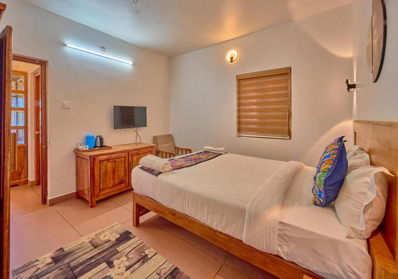 Bed in Silent Retreat Ooty Pool Resort by VOYE HOMES