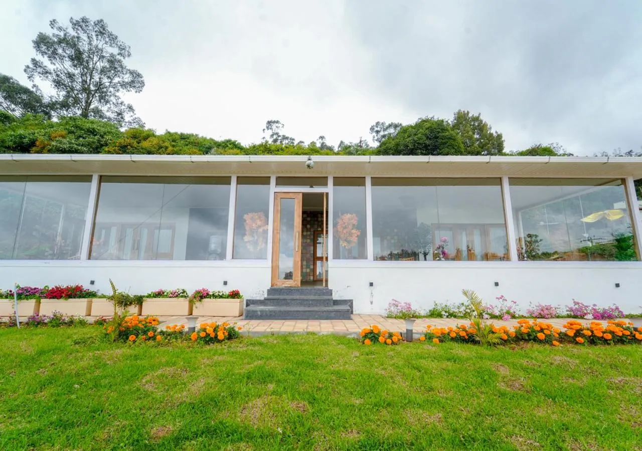 Property building in Silent Retreat Ooty Pool Resort by VOYE HOMES