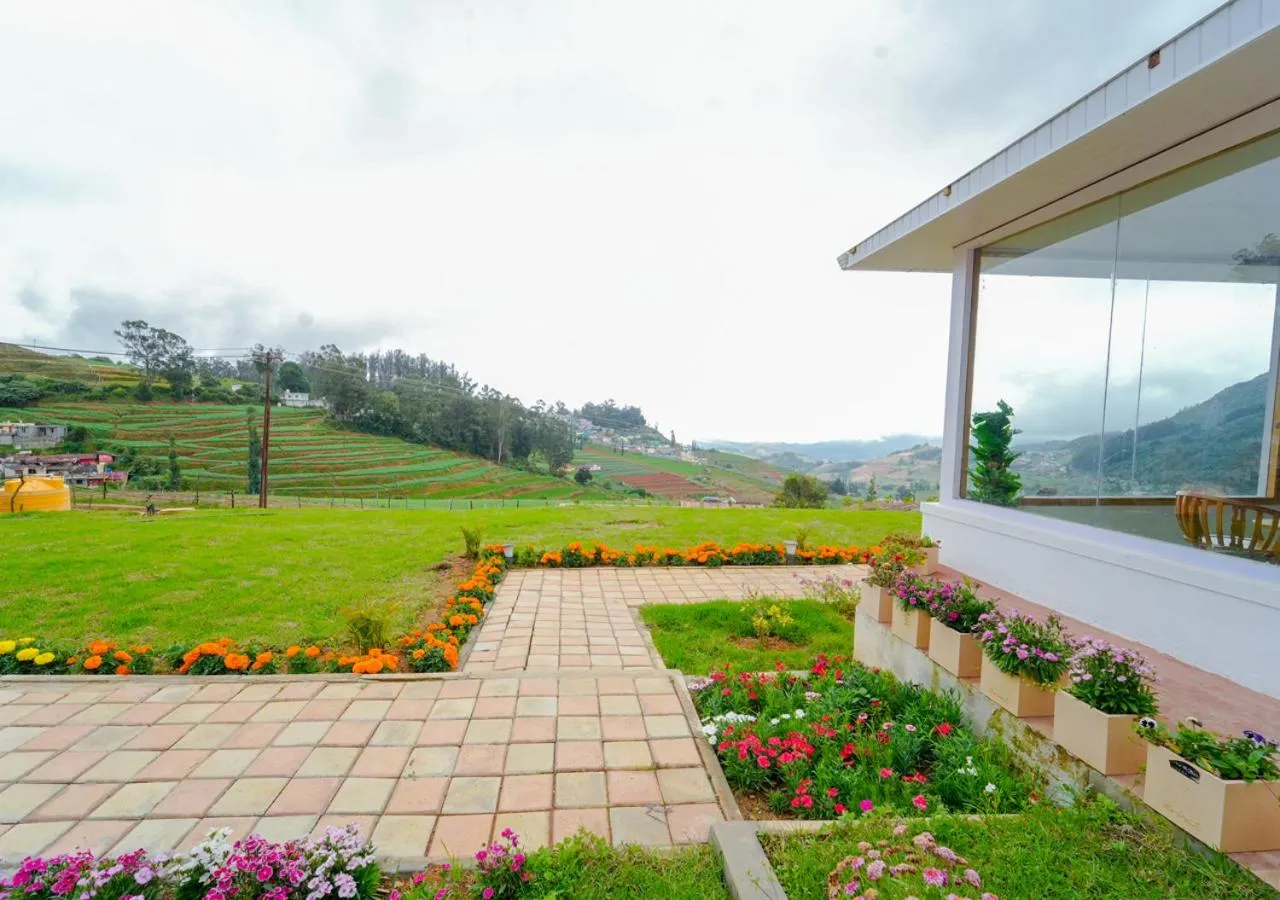 Property building in Silent Retreat Ooty Pool Resort by VOYE HOMES