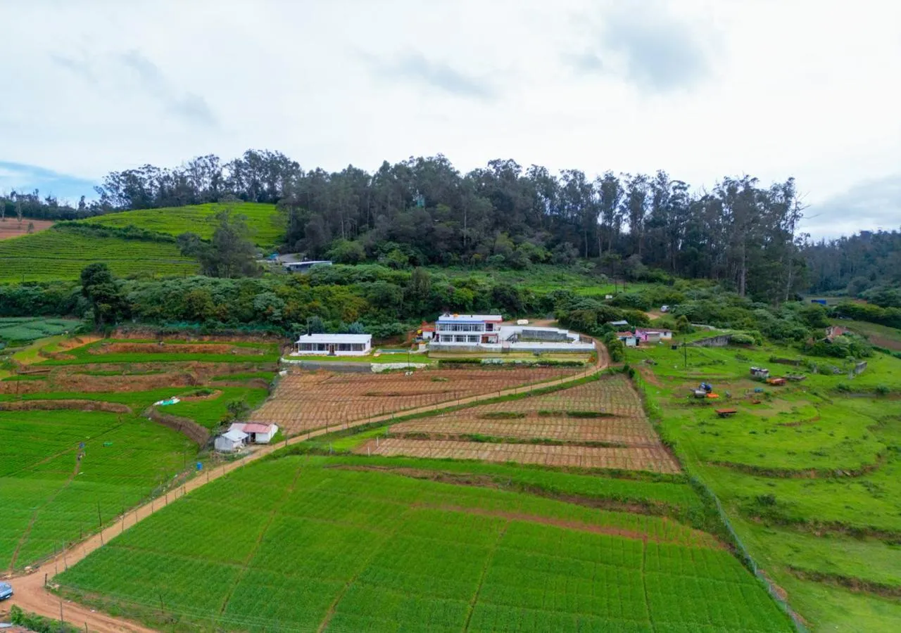 Property building in Silent Retreat Ooty Pool Resort by VOYE HOMES