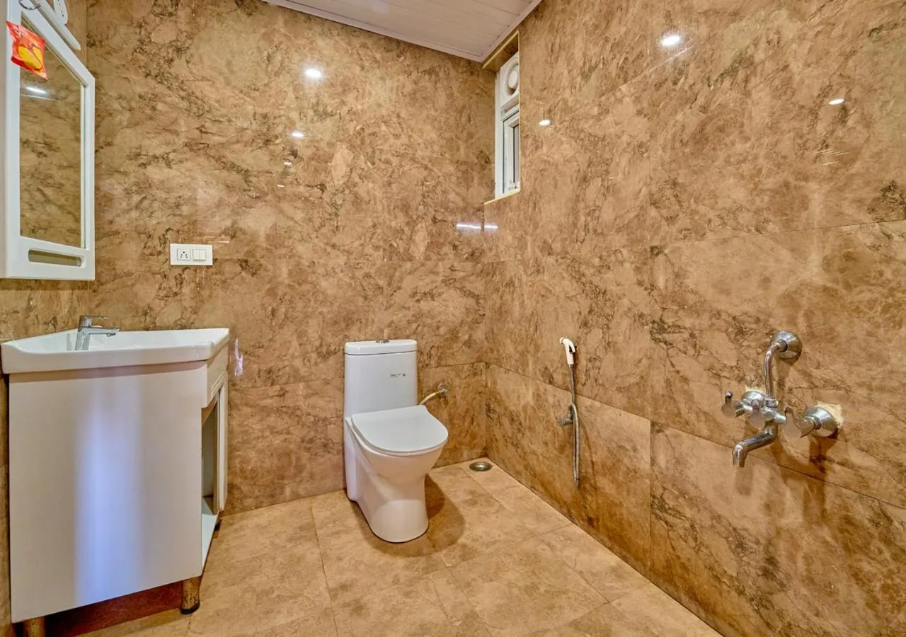 Shower in Silent Retreat Ooty Pool Resort by VOYE HOMES