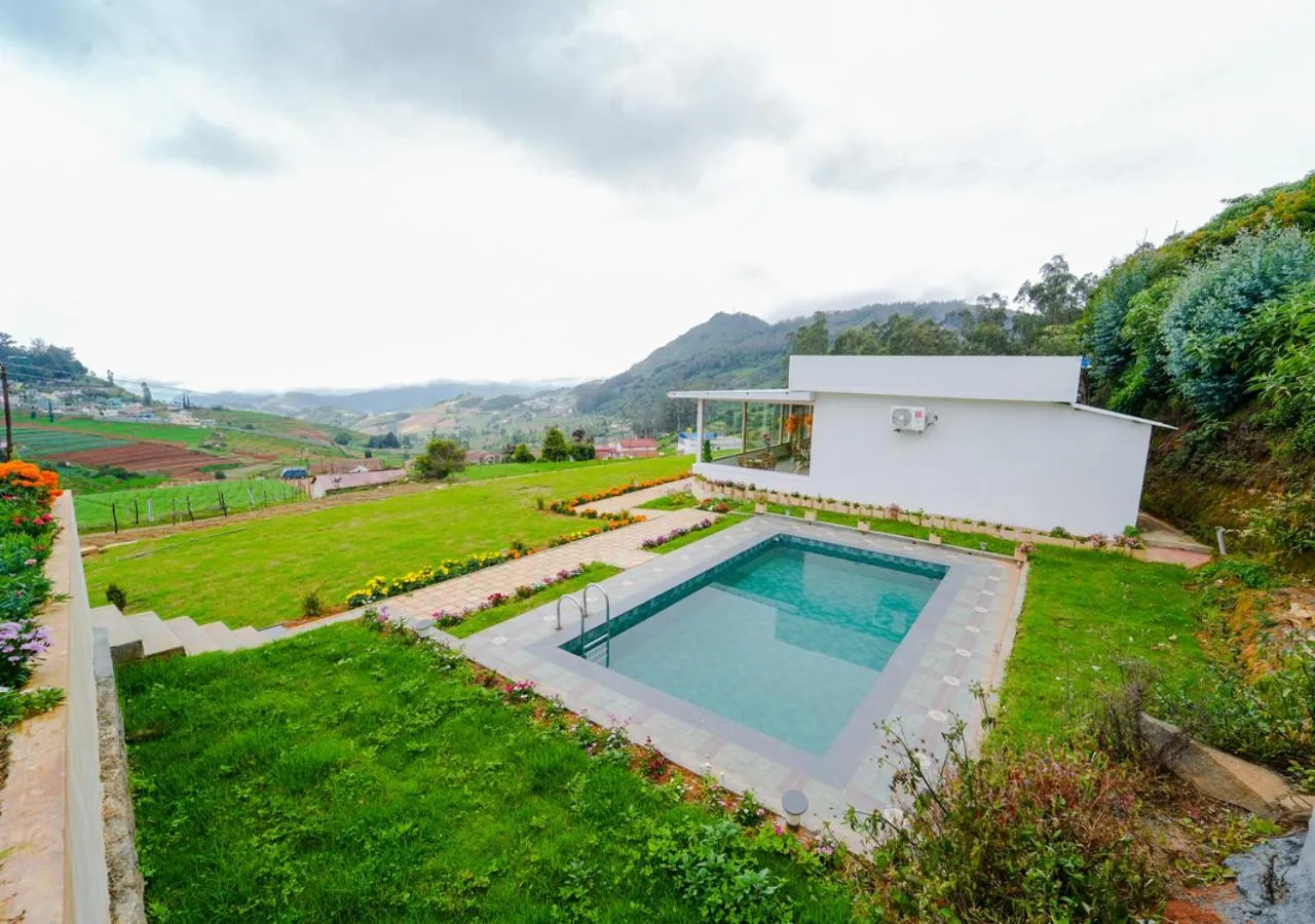 Property building in Silent Retreat Ooty Pool Resort by VOYE HOMES