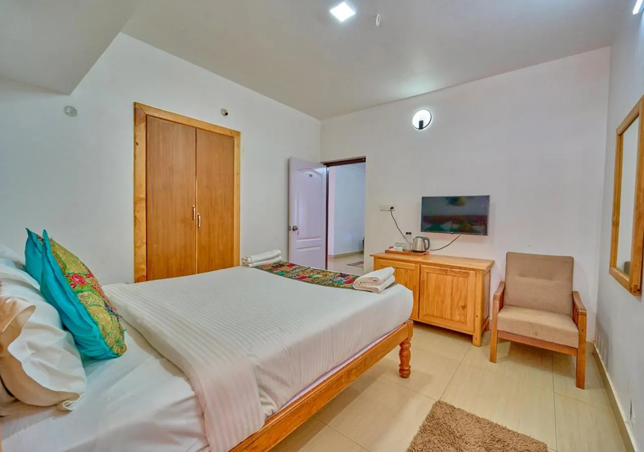 Photo of the whole room, Bed in Silent Retreat Ooty Pool Resort by VOYE HOMES