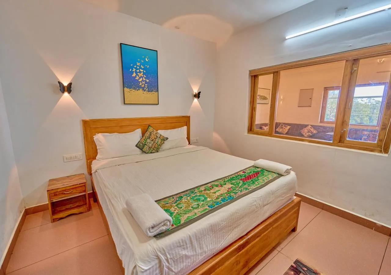 Photo of the whole room, Bed in Silent Retreat Ooty Pool Resort by VOYE HOMES