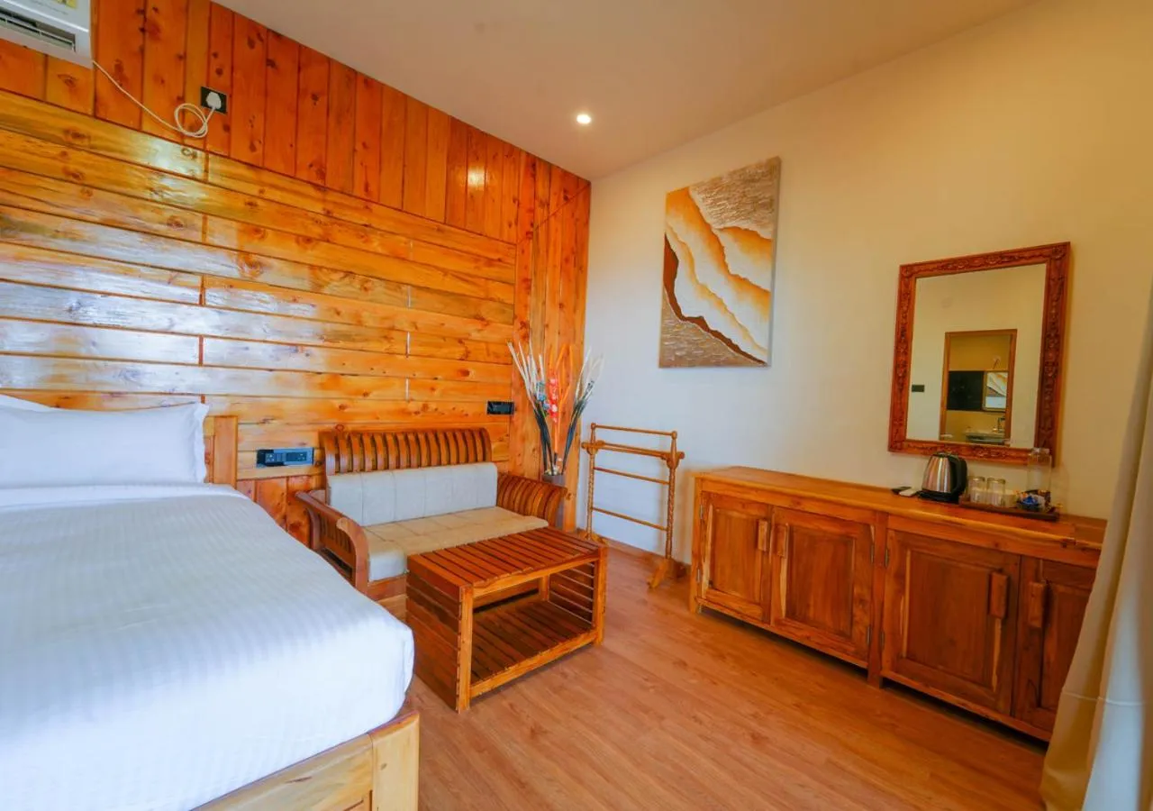 Bed in Silent Retreat Ooty Pool Resort by VOYE HOMES