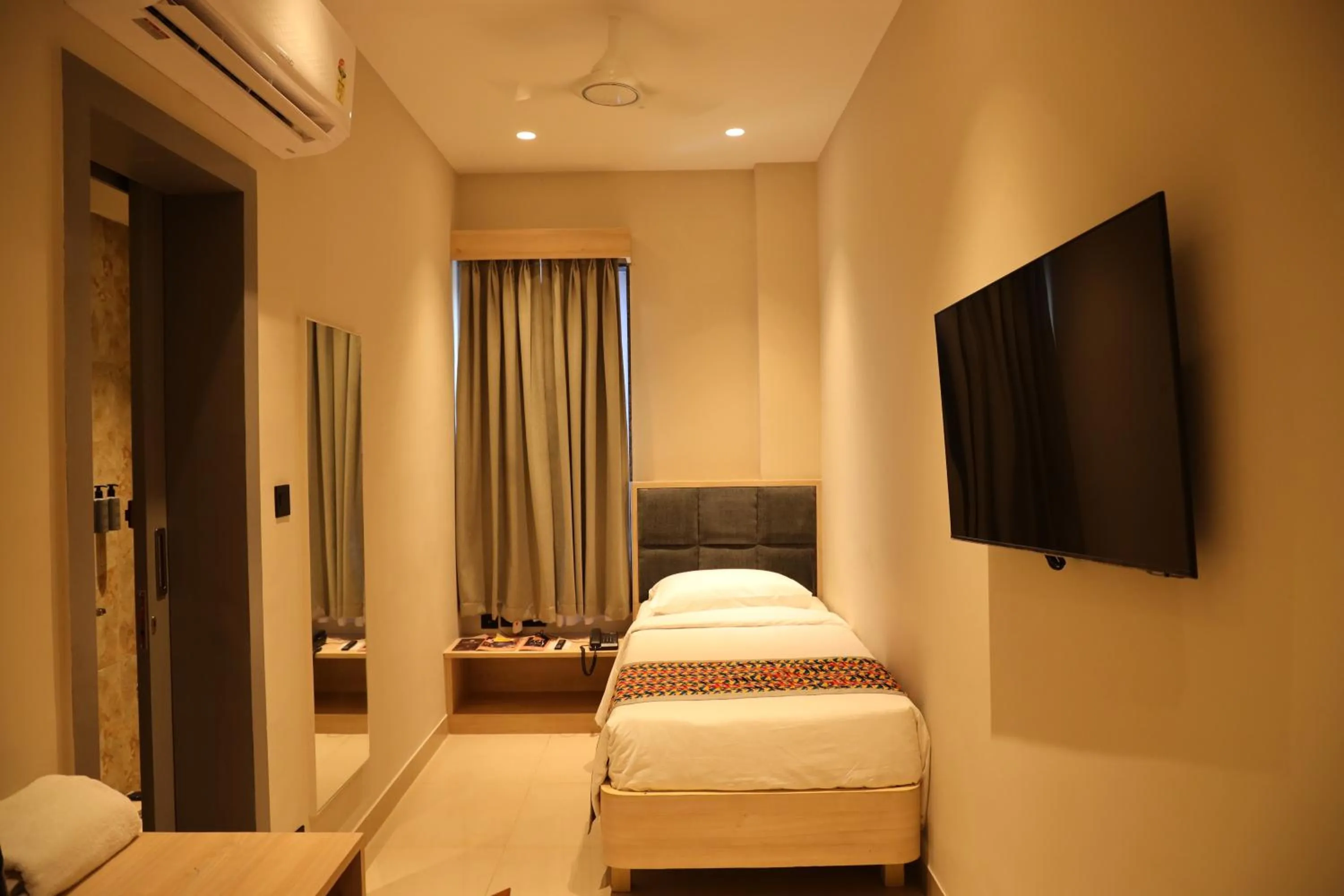 Bed in The Citi Residenci Hotel, Banskopa