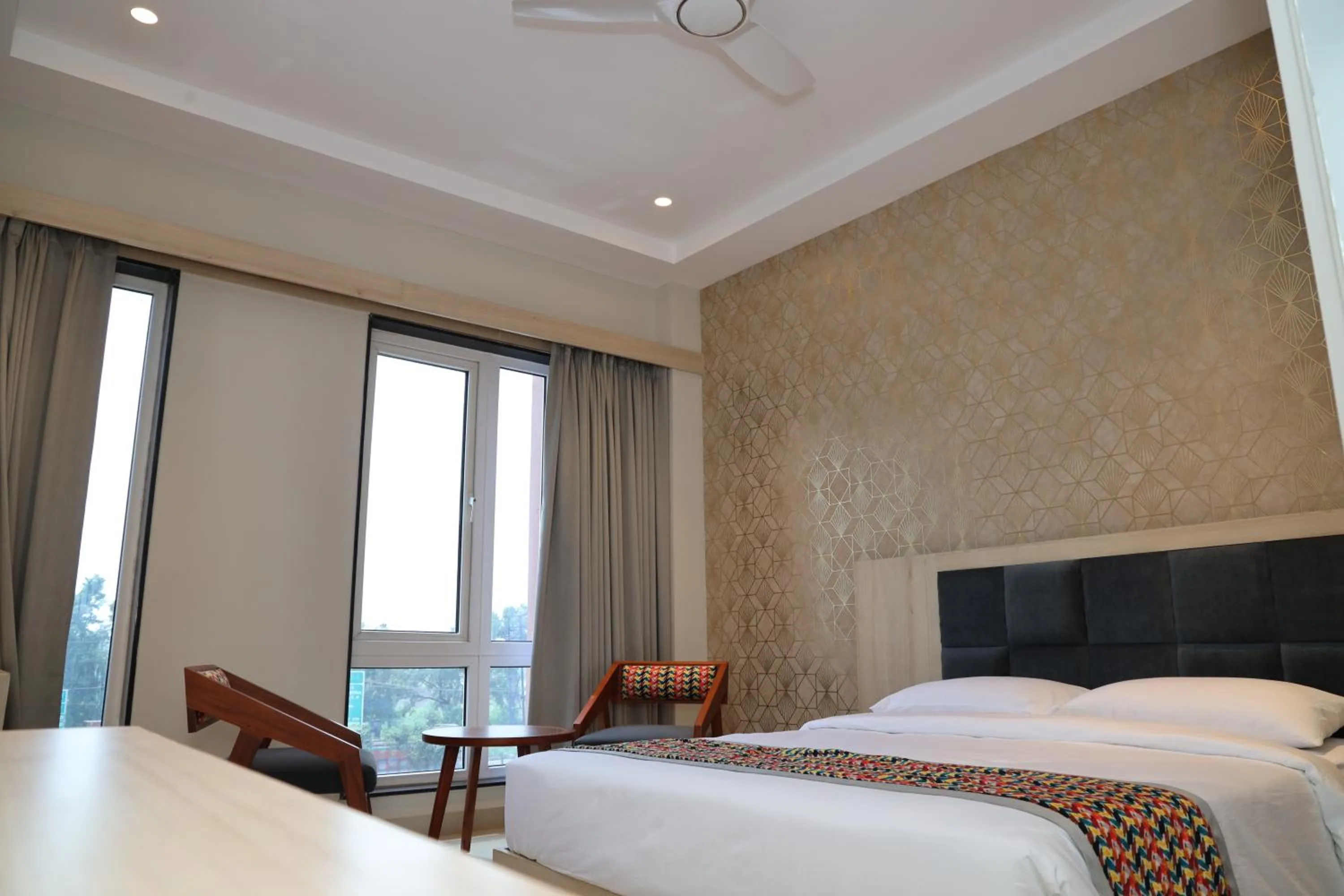 Seating area, Bed in The Citi Residenci Hotel, Banskopa