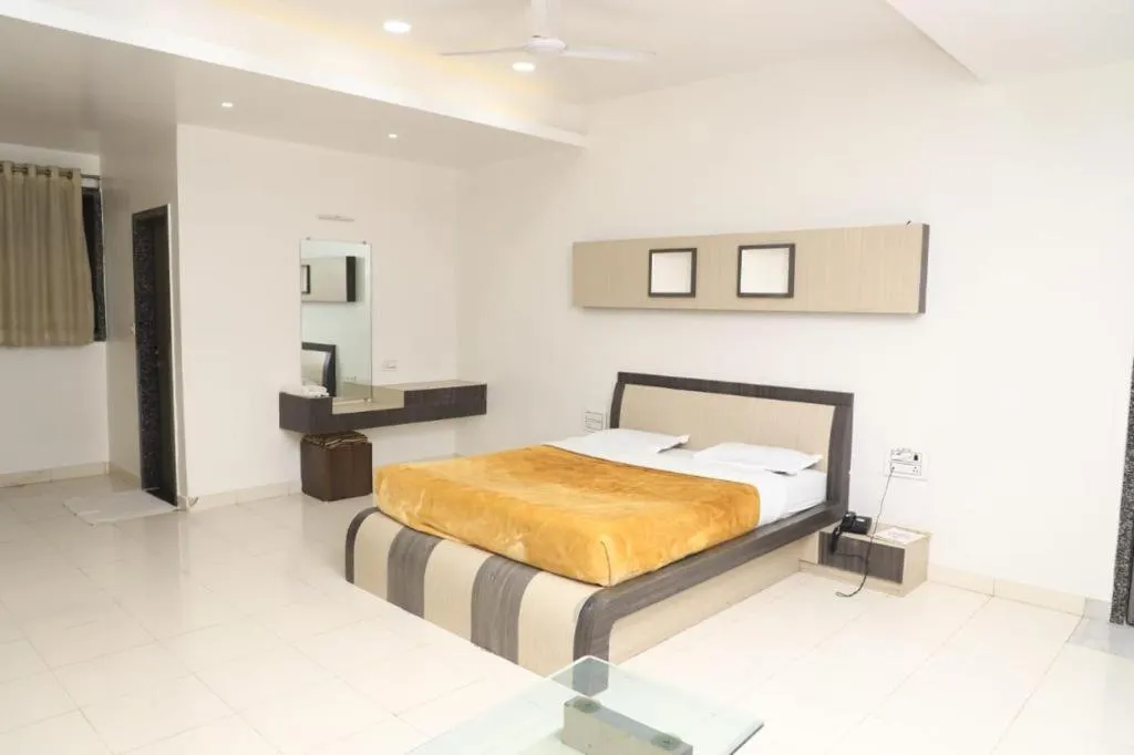 Photo of the whole room, Bed in The Byke Embassy - Surat