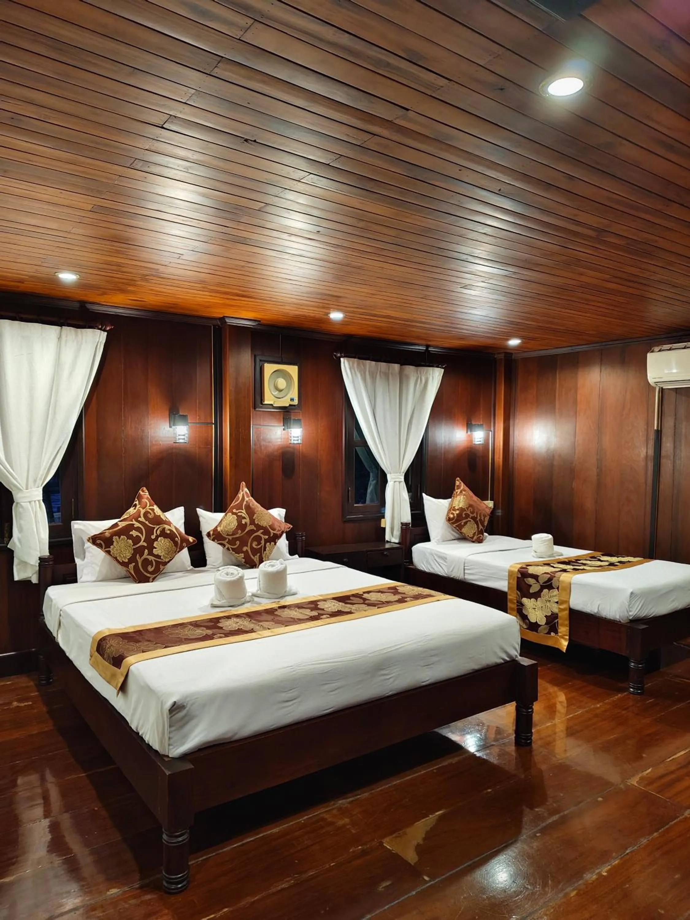 Bed in Bouakham Chanthasack Guesthouse