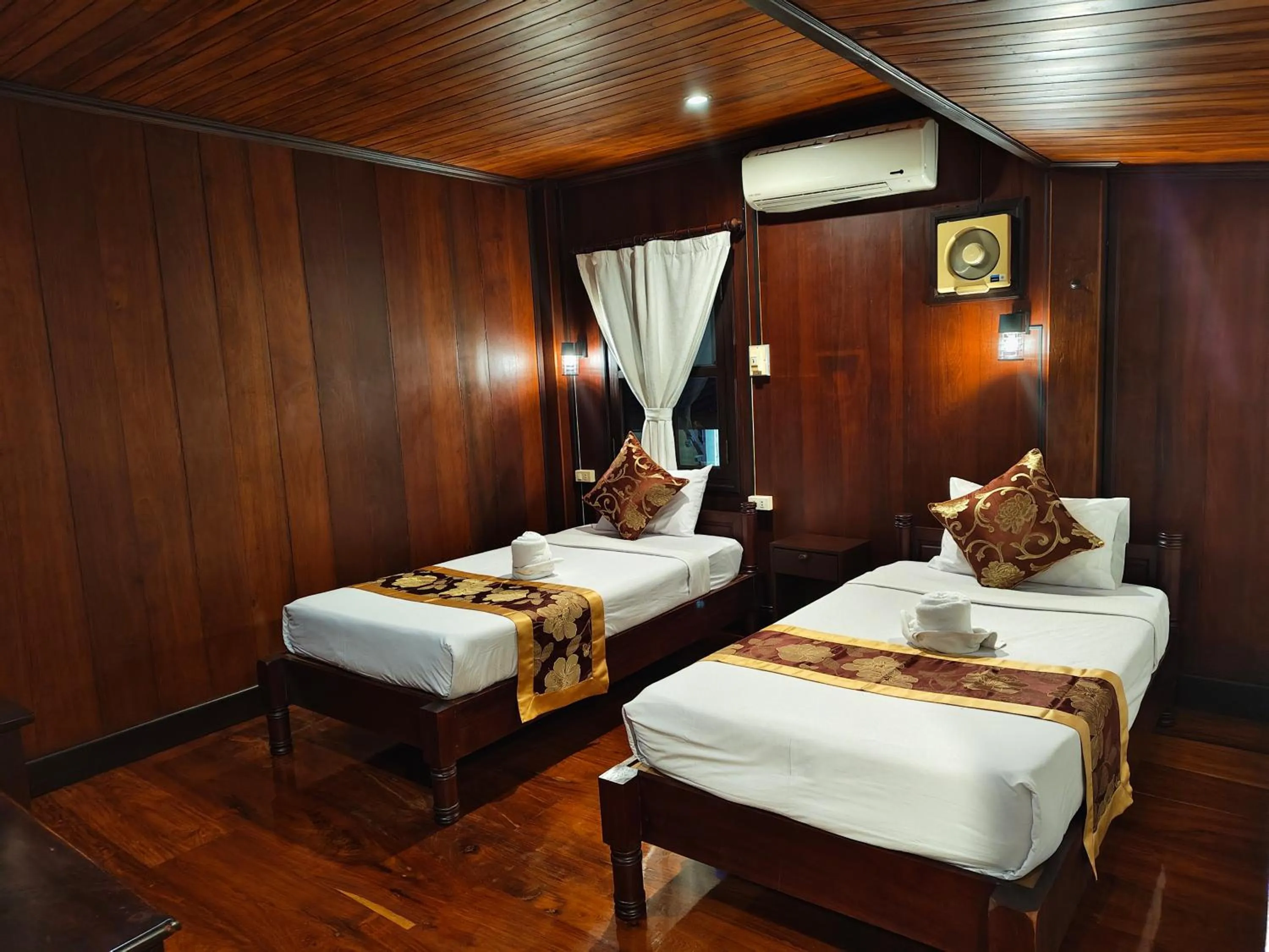 Bed in Bouakham Chanthasack Guesthouse