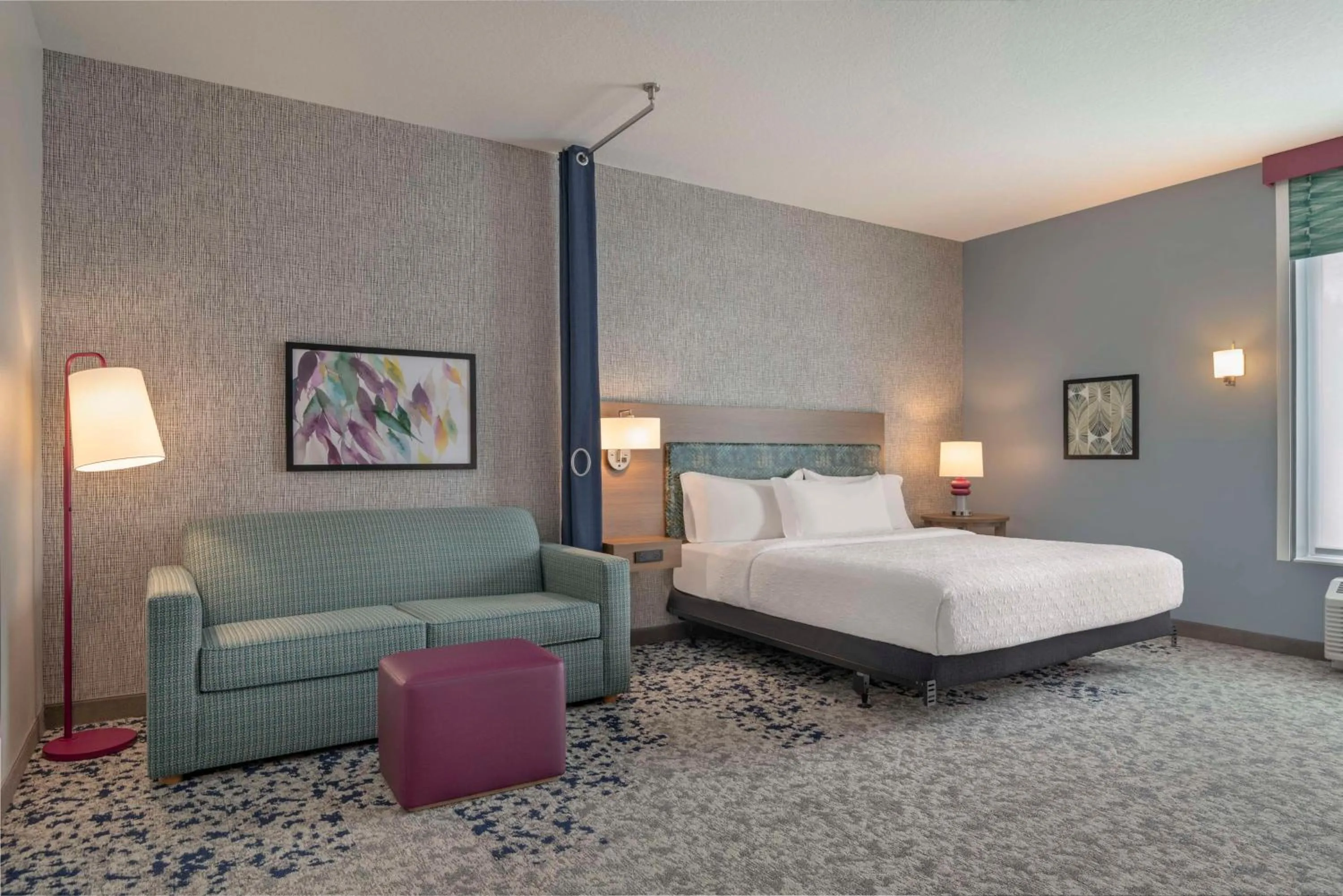 Living room, Bed in Home2 Suites By Hilton Sanford Orlando North