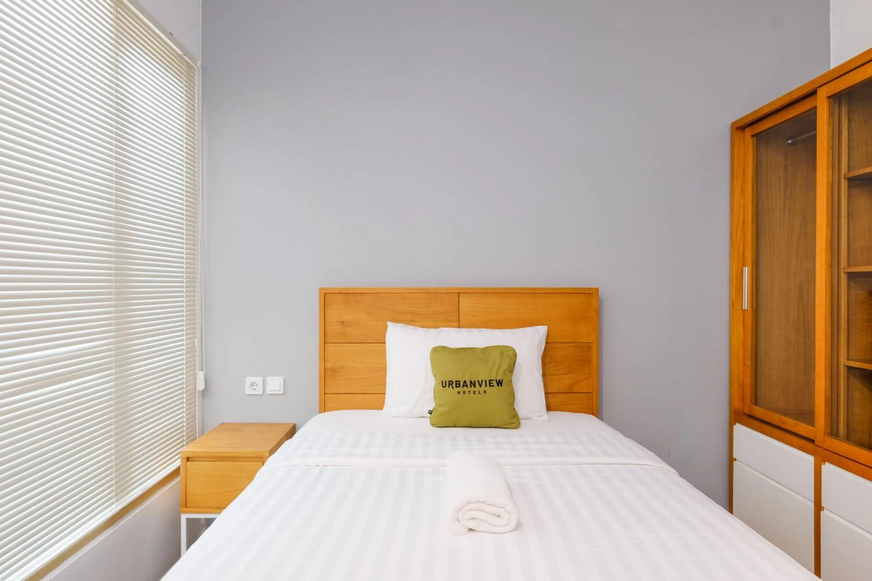 Bedroom, Bed in Urbanview Code Riverstay Yogyakarta