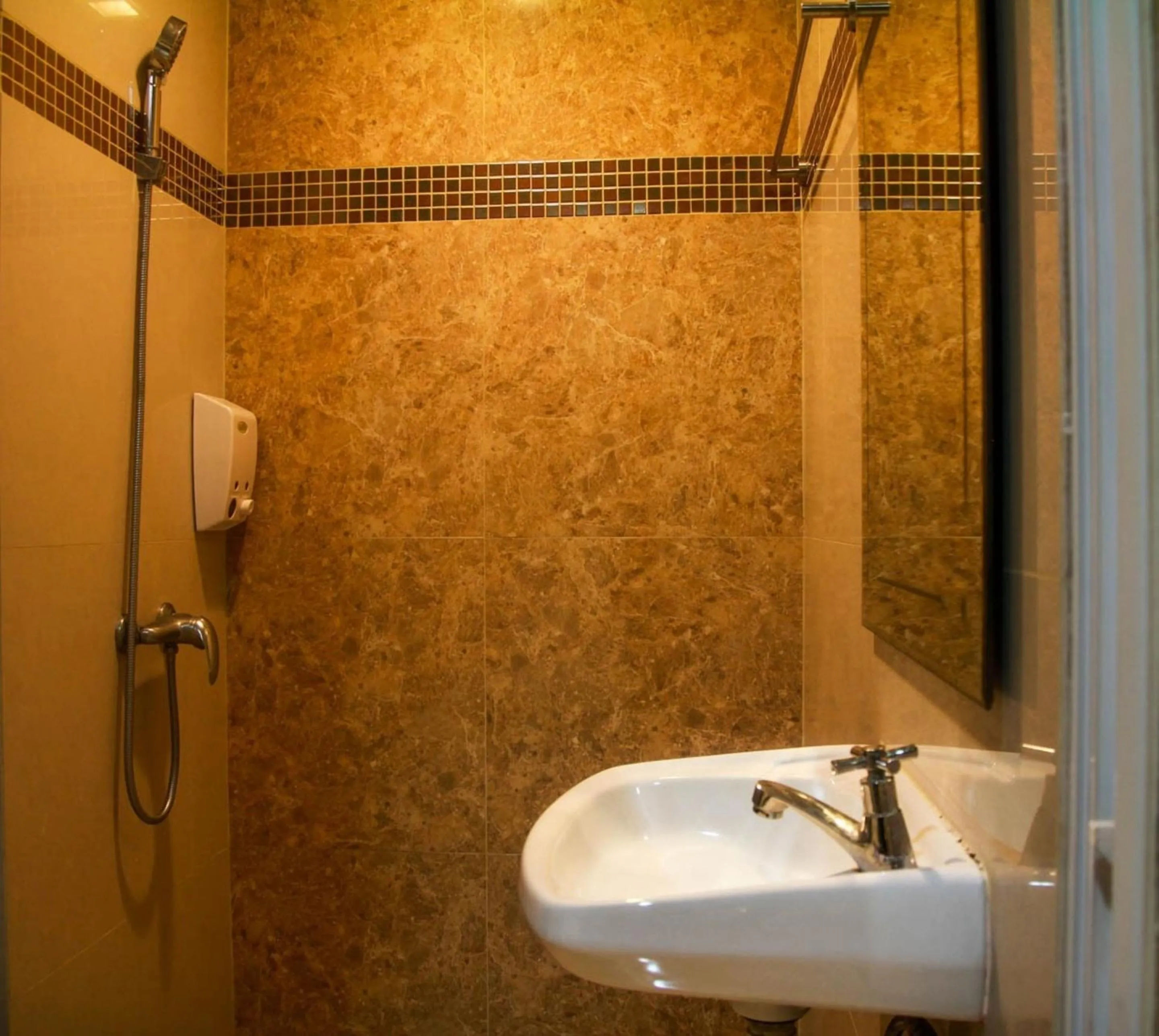 Shower in Grandsmile Wellness Resort